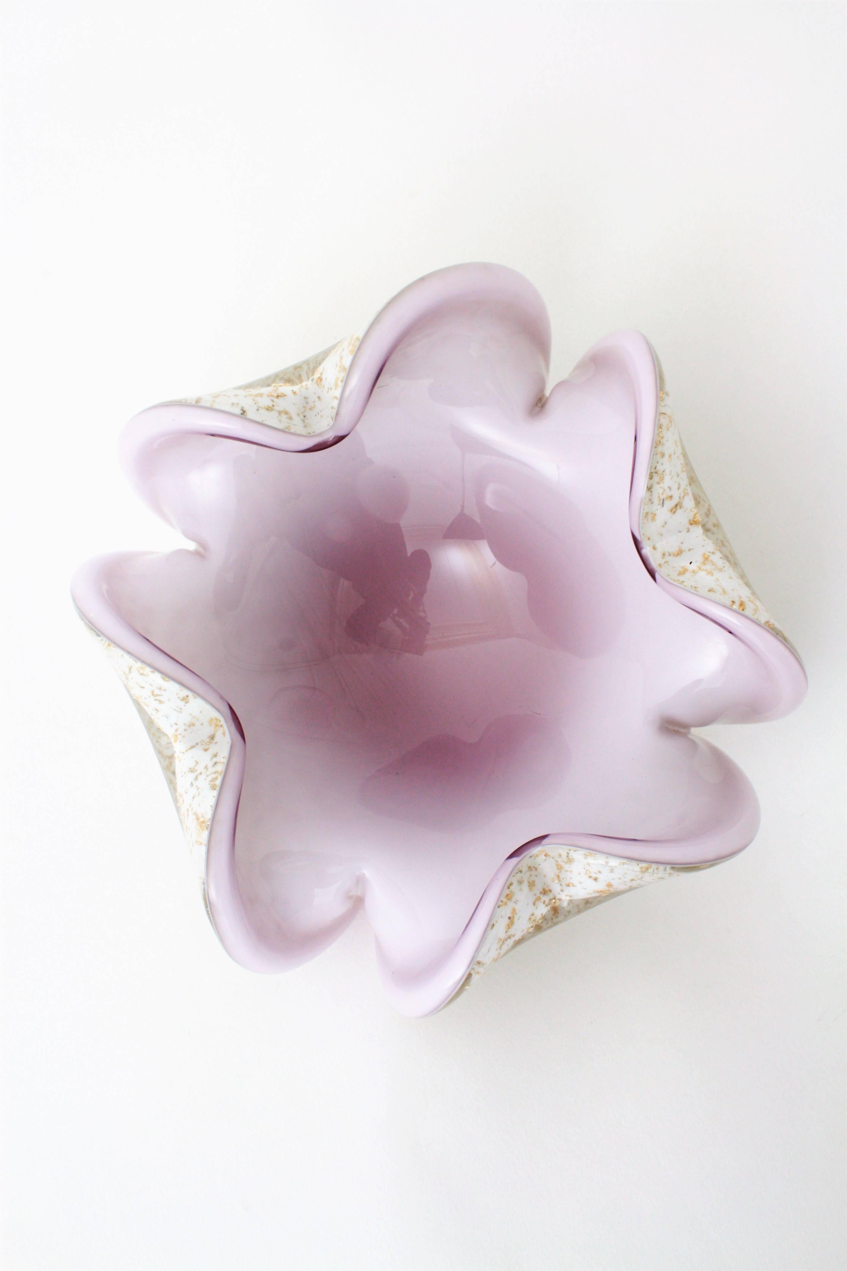 Beautiful handblown Murano glass flower shaped bowl in pale purple and white with aventurine silver and gold flecks decoration. Lovely to use as candy bowl, jewelry bowl or vide poche or ashtray, Italy, 1960s.
 