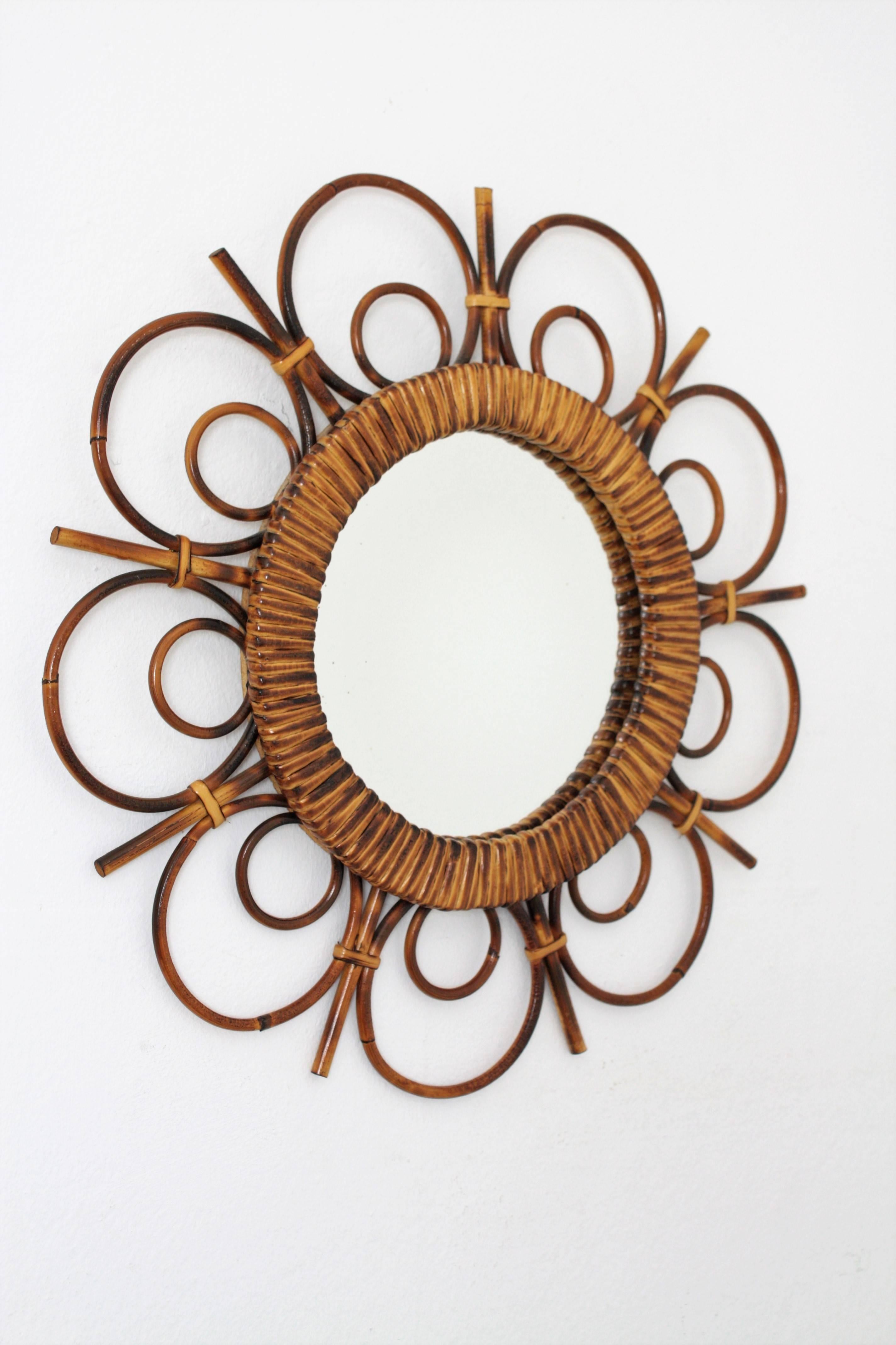 Spectacular hand-crafted rattan flower burst mirror. This piece has all the Mediterranean taste of the French Riviera.
A highly decorative piece to place alone or to create a wall decoration with other bamboo or rattan mirrors.
France