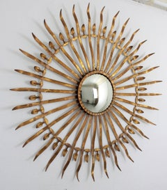 Grand miroir convexe Sunburst en fer doré des années 1950, style Hollywood Regency espagnol