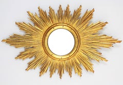 Hollywood Regency Carved Giltwood Oval Sunburst Convex Mirror, Spain 1940s
