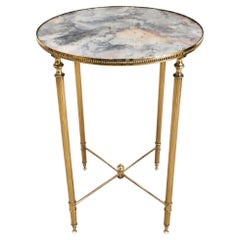 Circa 1940 French Neo-classical brass drinks table with eglomise glass