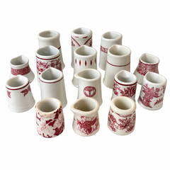 Collection of 19 Handleless Restaurantware Creamers in White and Red