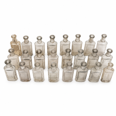 Collection of 24 Early 20th-Century Clear Glass Apothecary and Laboratory