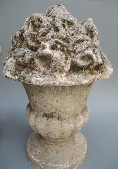 Pair of French Neoclassical Style Cast Stone Urns with Flowers