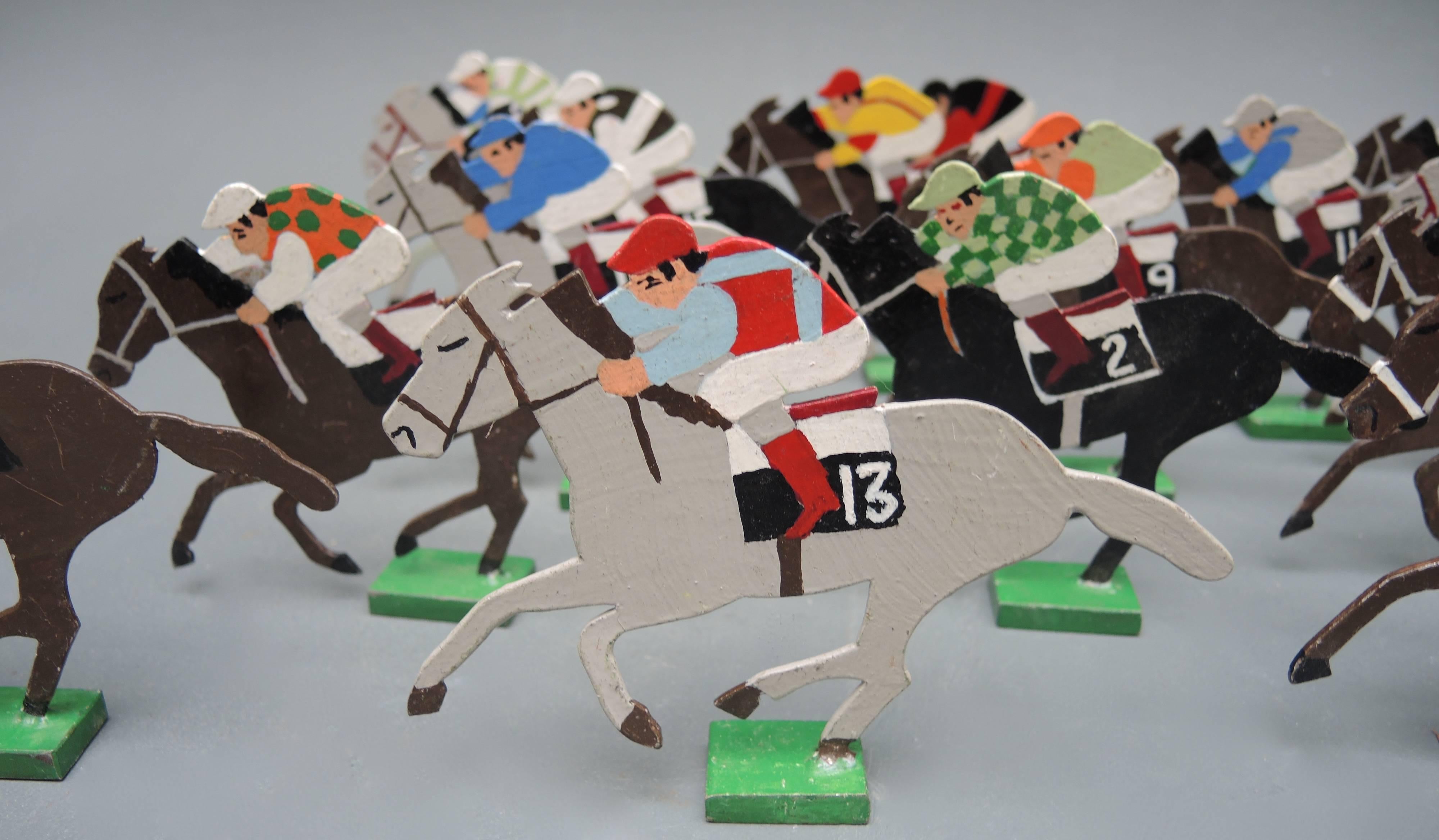 15 circa 1940 race horse game markers. These would be great to use on a table as a central decoration (they are all painted on both sides) or write your guests names on each horse with a sharpie pen to use as place cards! The perfect gift for the