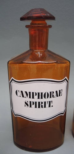 Collection of Nine Belgian Amber Glass Apothecary Bottles, circa 1890