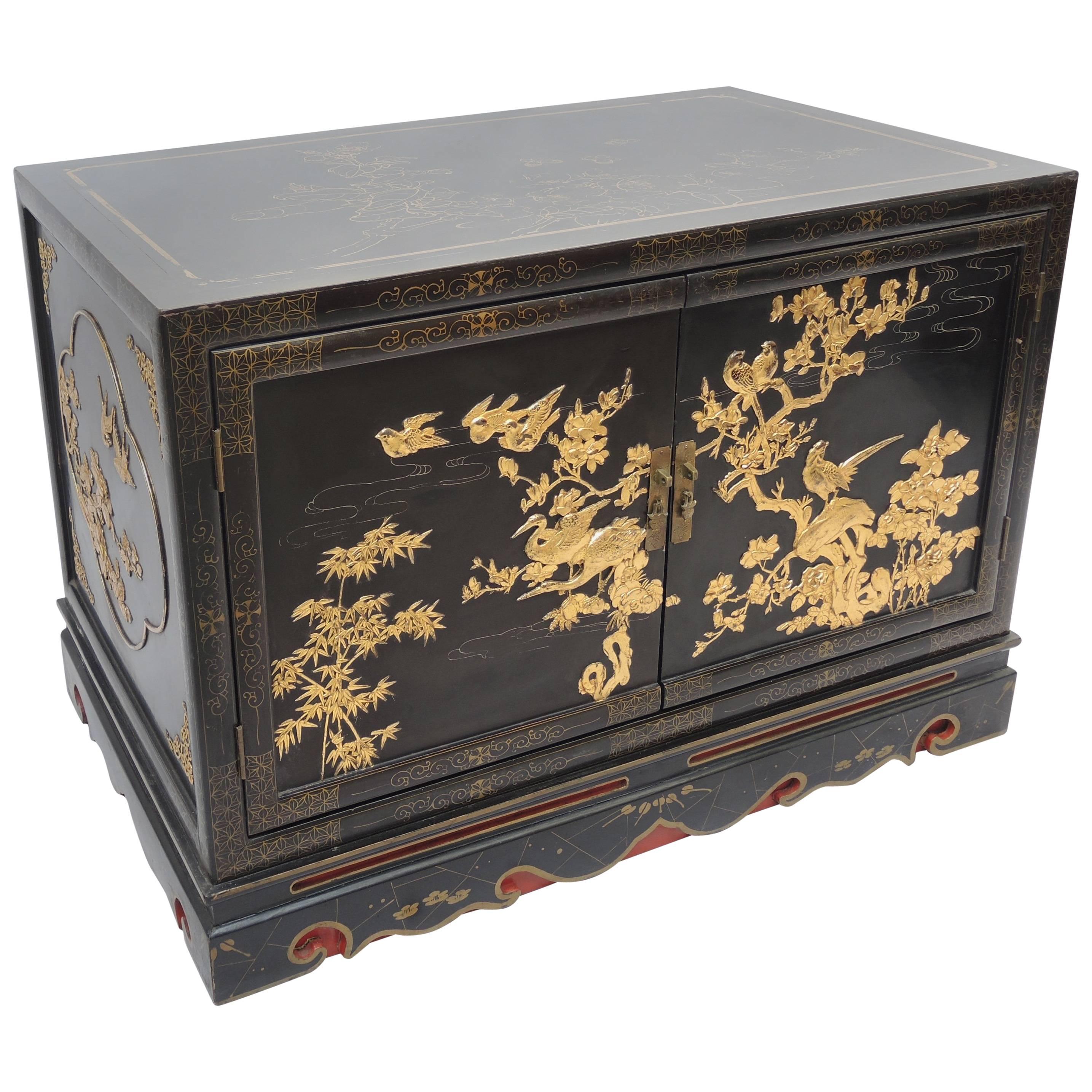 Vintage Black and Gold Lacquered Chinese Export Cabinet