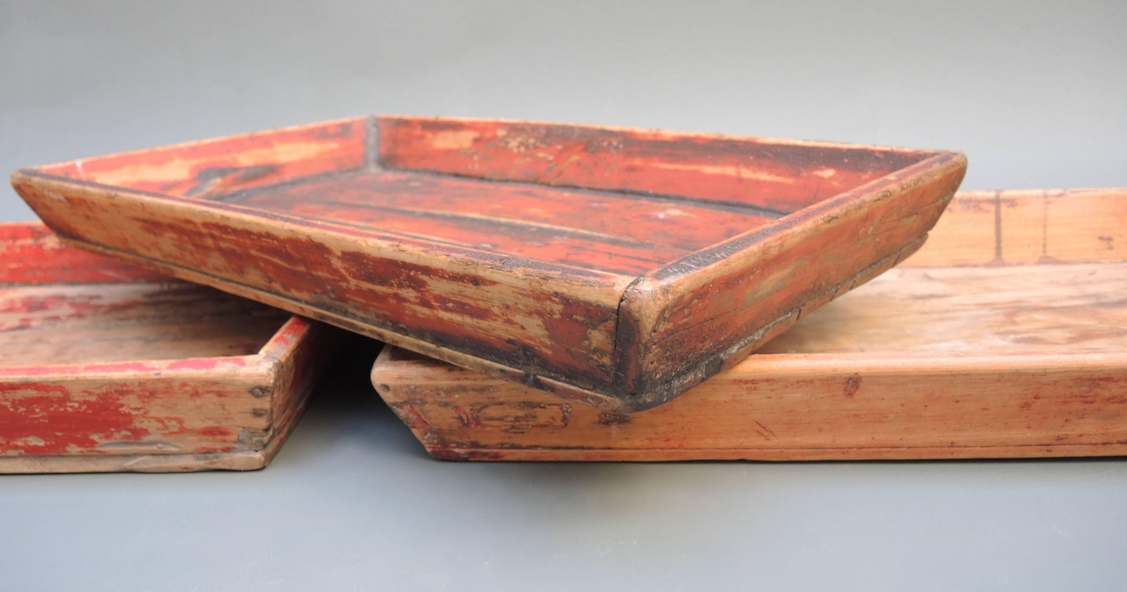 Antique Chinese Provincial trays retaining the original paint and a wonderfully soft worn patina. They are well constructed and as useful and strong today as they were over 100 years ago.
The measurement listed is approximate as each tray is