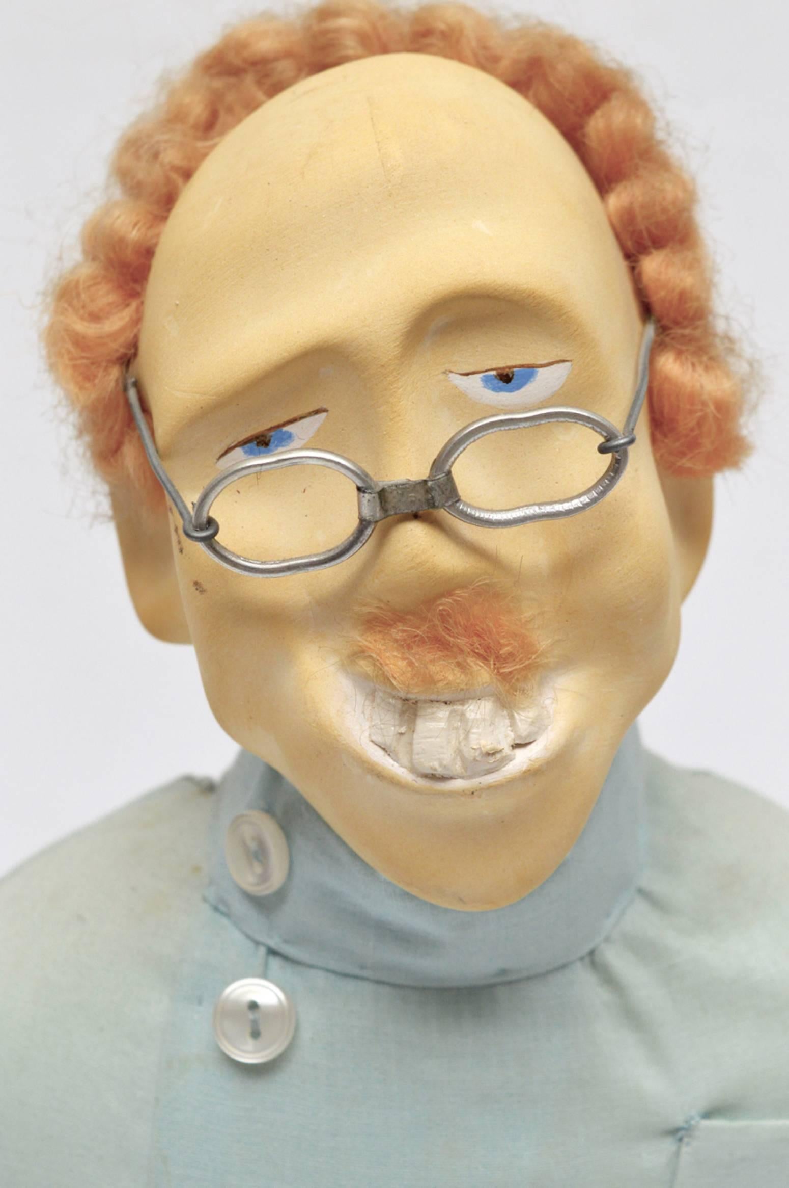 This is such a strange and wonderful item! The head is made from a plaster and plastic composition material used for model making in the 1930s and 1940s.The body is soft filled textile and is connected a turned wood stand.
A great item for a