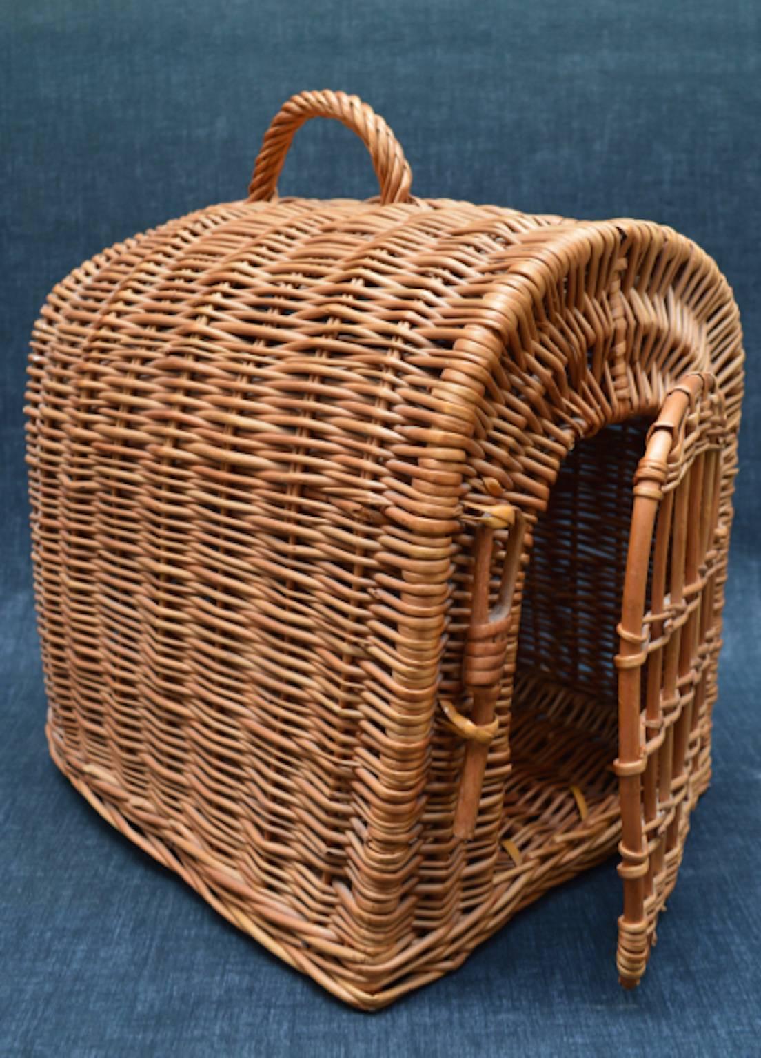 Country chic vintage wicker basket pet carrier is in excellent condition and can be used as a cozy bed or travel carrier for a cat or small dog.
Also just a chic prop in a country home.