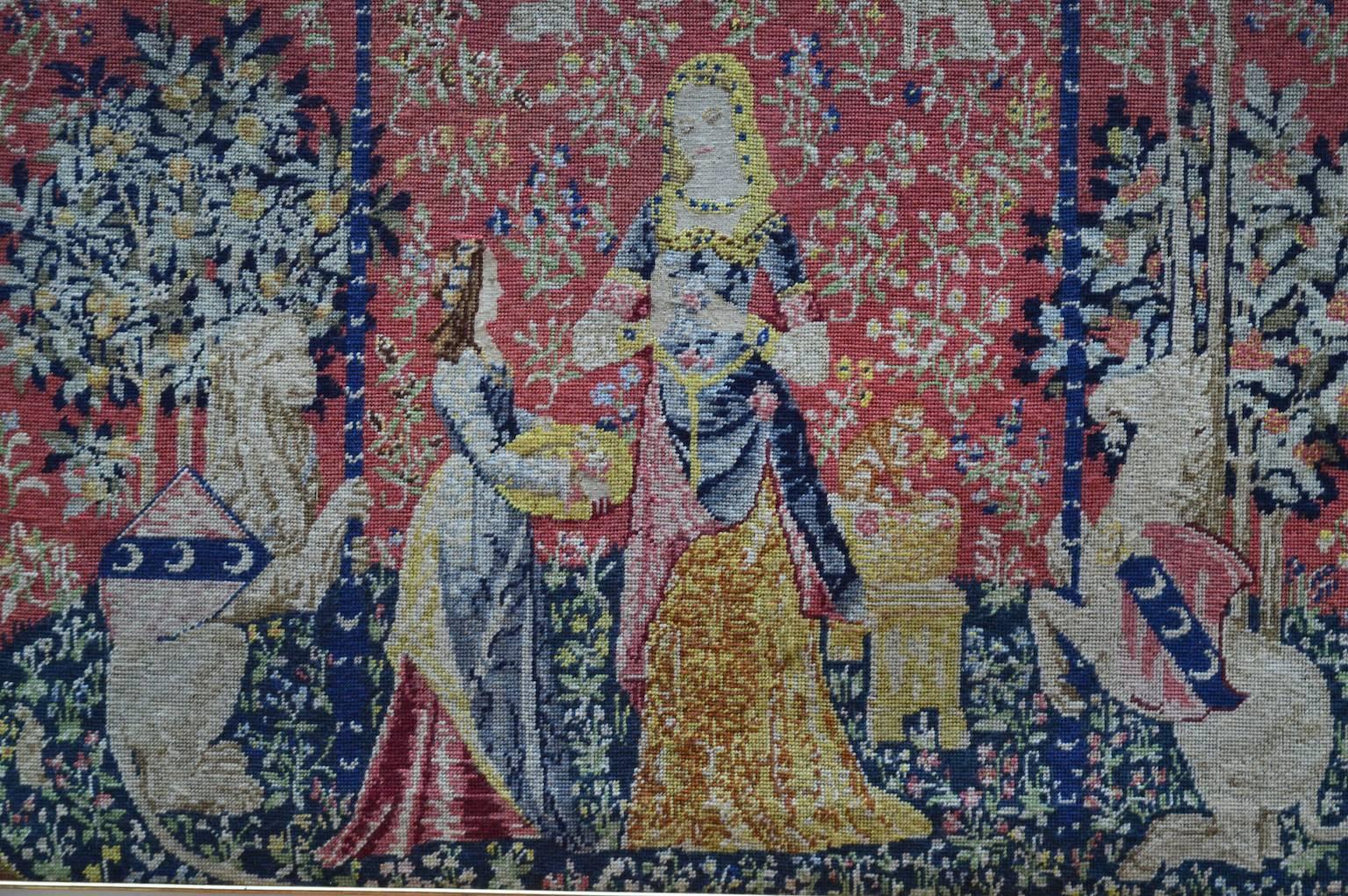 Beautifully executed Medieval style wool tapestry handmade using needlepoint and petit point stitches. Framed in a wood gesso and gold leaf frame. 

Inspired by 