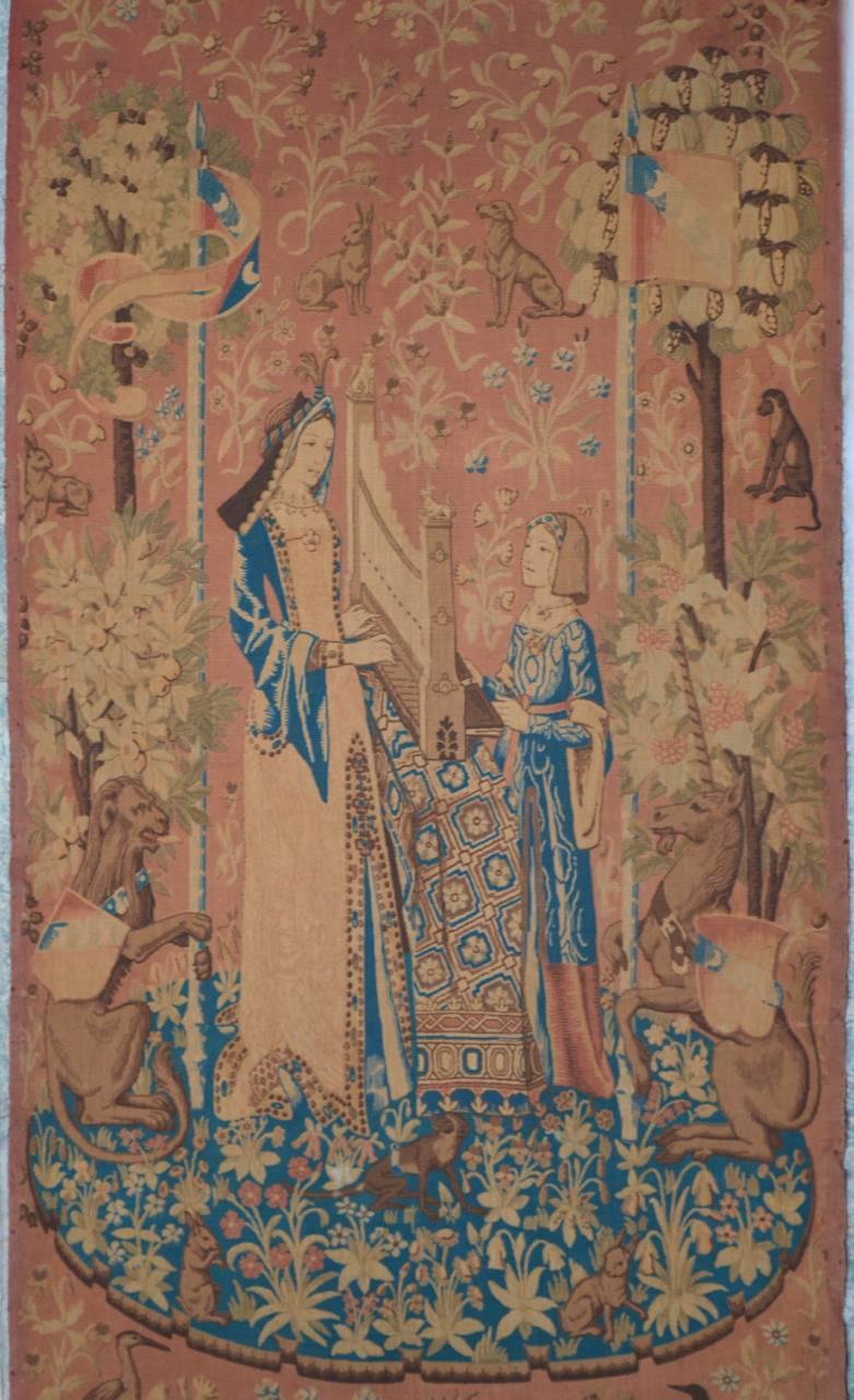 Fantastic large theatre wall hanging from the entrance of a theatre in Antwerp Belgium.
Woven cotton textile with hand screen printed design is made to emulate a 16th century Flemish tapestry. Beautiful blue and peach colors are rich without being