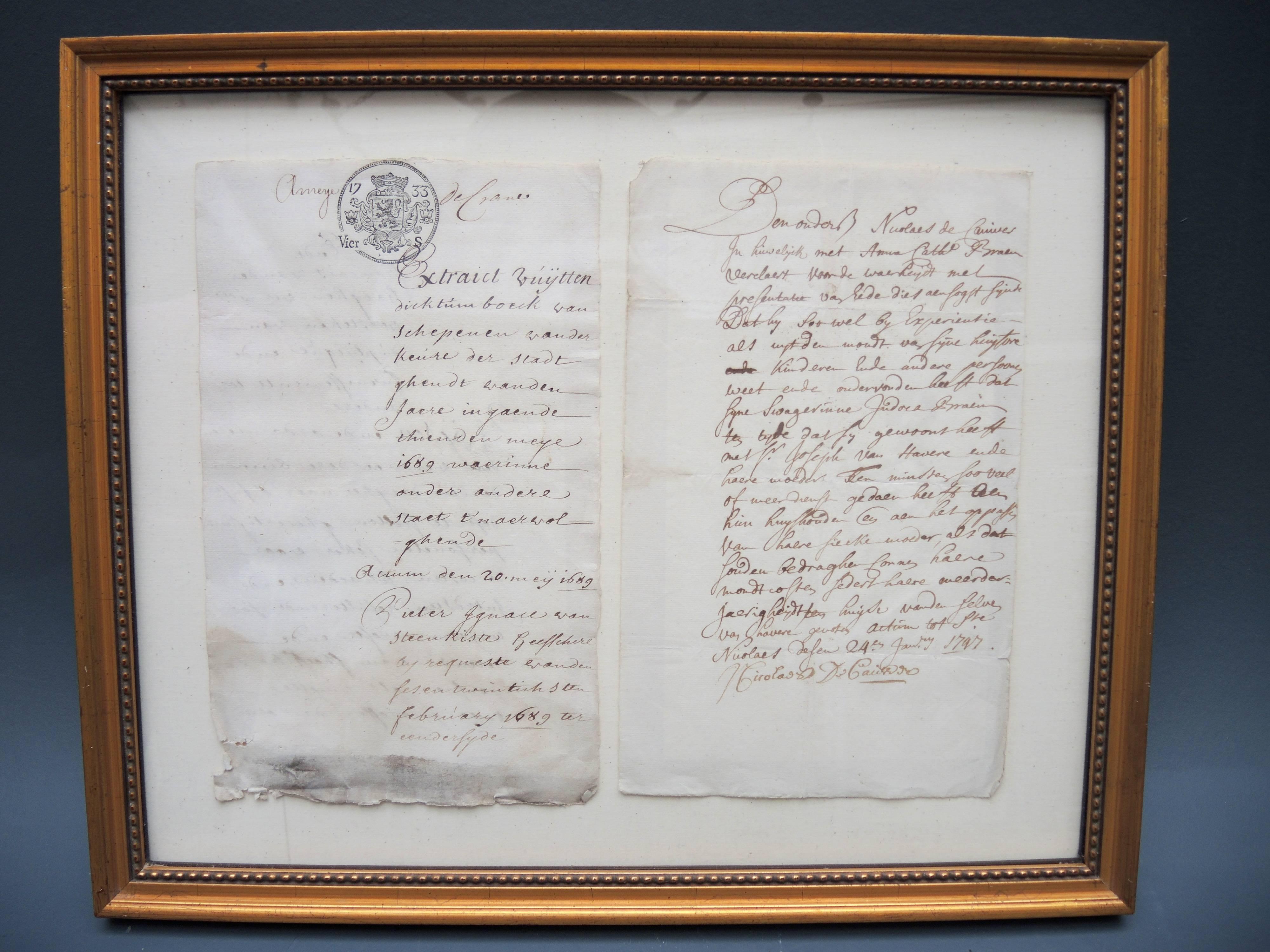 Beautifully hand written documents with the Flemish seal. One dated 1733 and another 1731. Archival framing in gilt frames.
