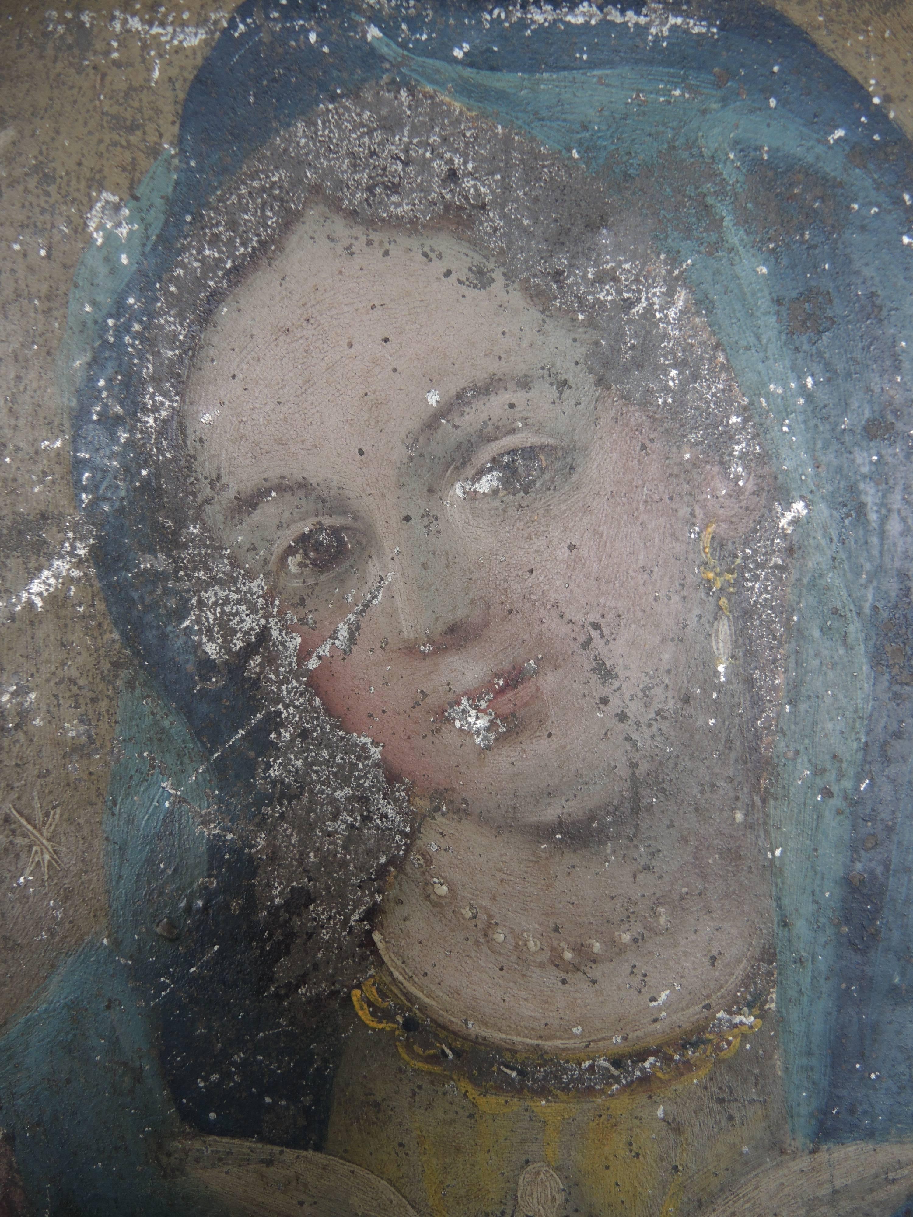 Lovely 19th century folk retablo painting on tin of Maria. Original paint without any restoration or in painting.