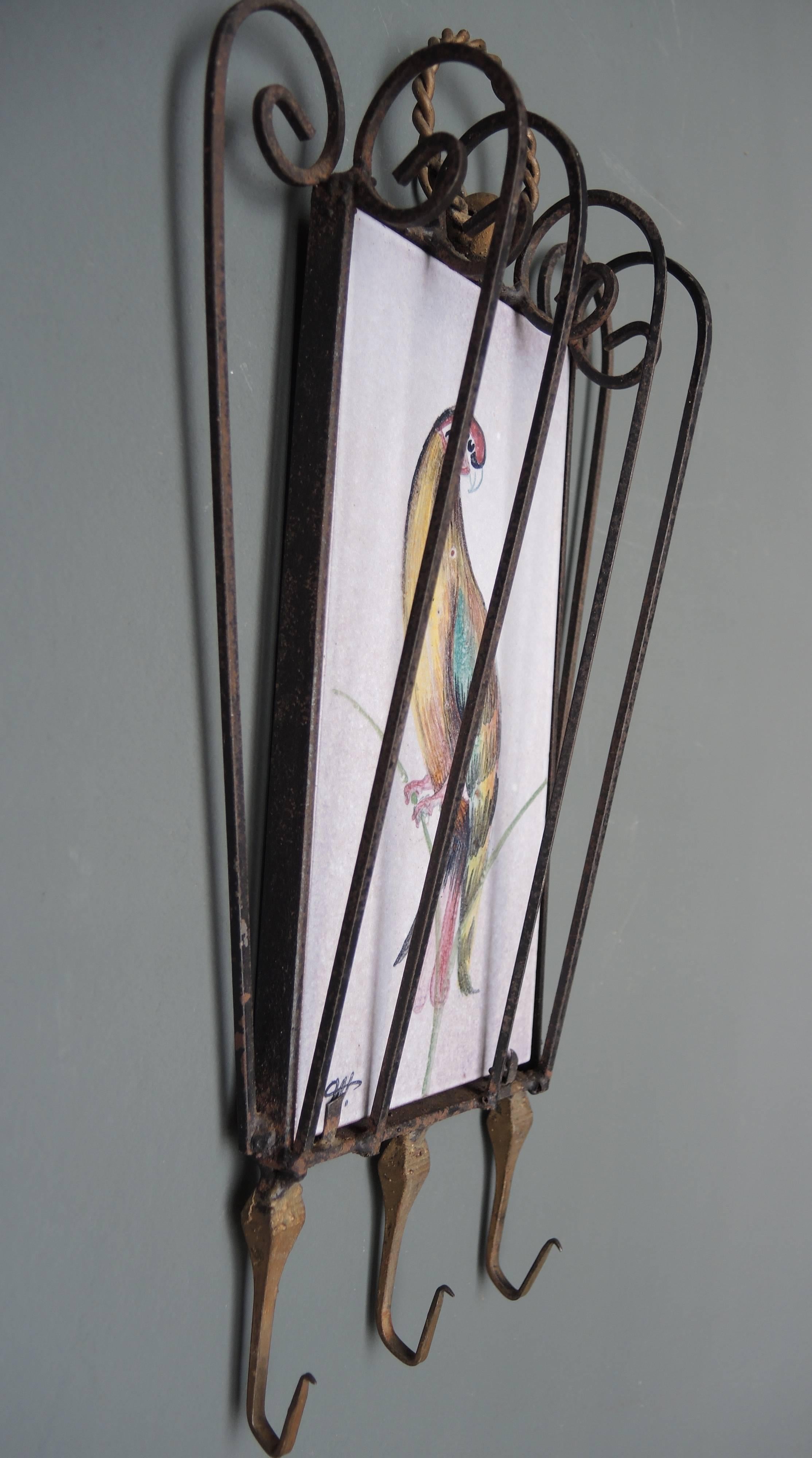 Wrought Iron Hooks Inset with Hand-Painted Belgian Tile with a Parrot In Good Condition For Sale In Antwerp, BE
