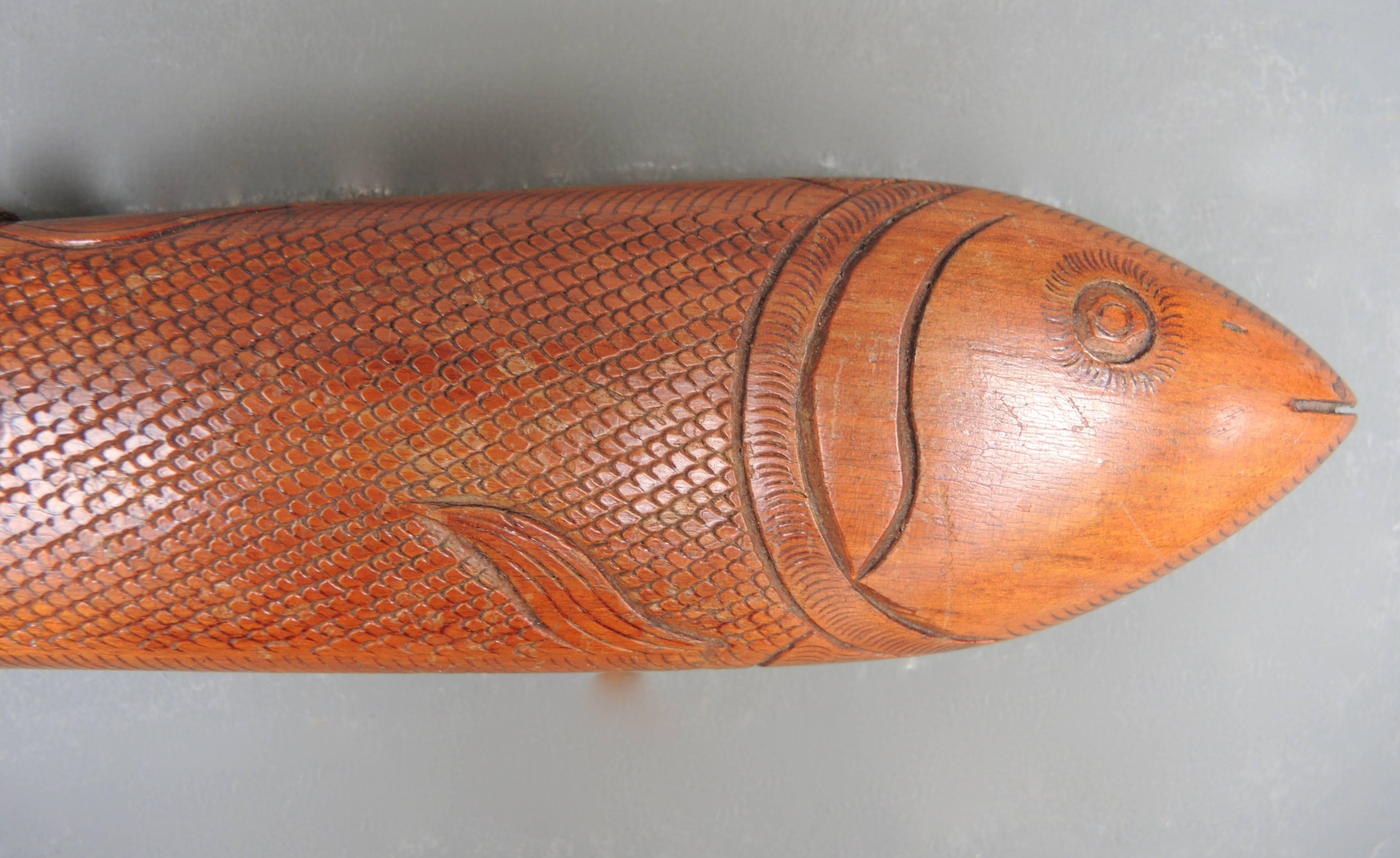 carved erotic fish
