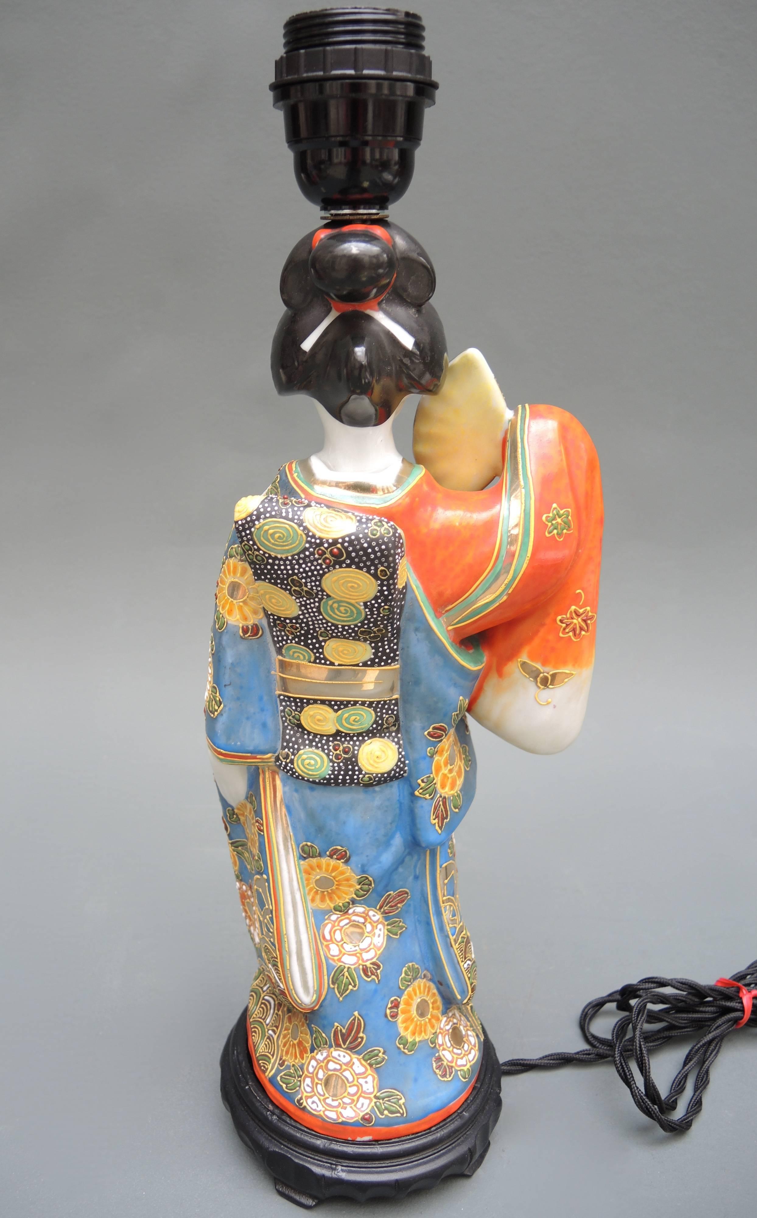 porcelain geisha statue