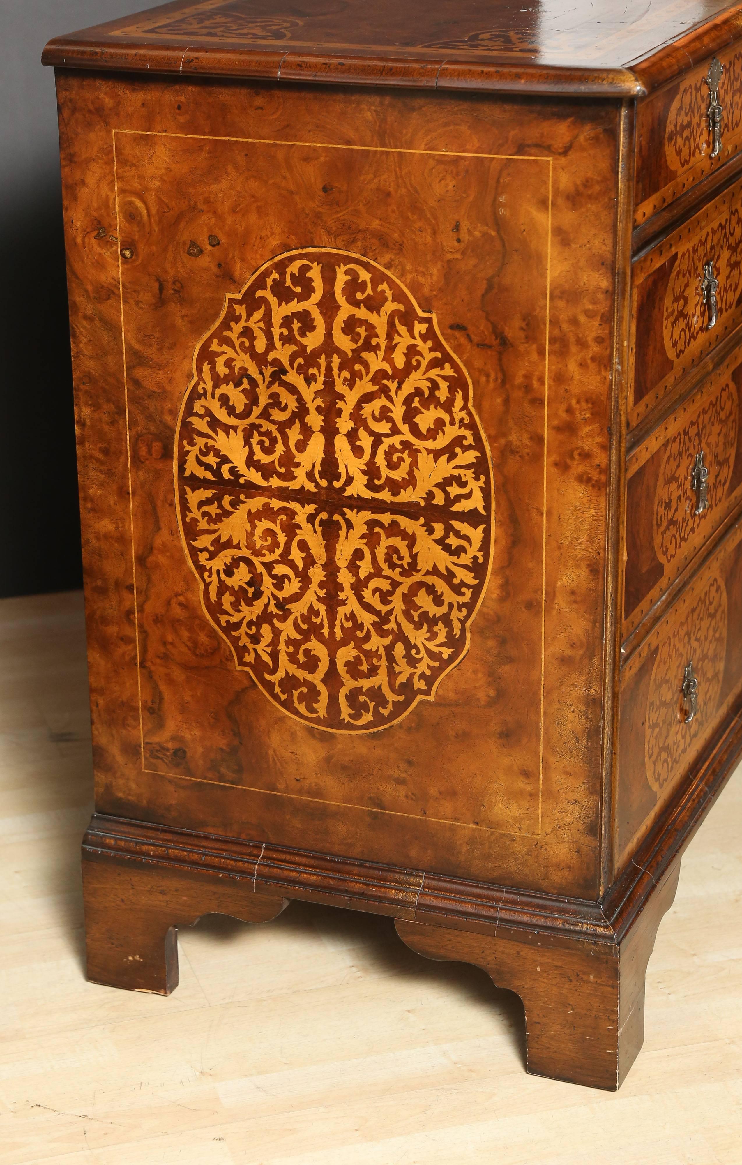 Burl walnut chest with "Seaweed" marquetry on front sides and top.
Quite a remarkable piece with a beautiful patina.