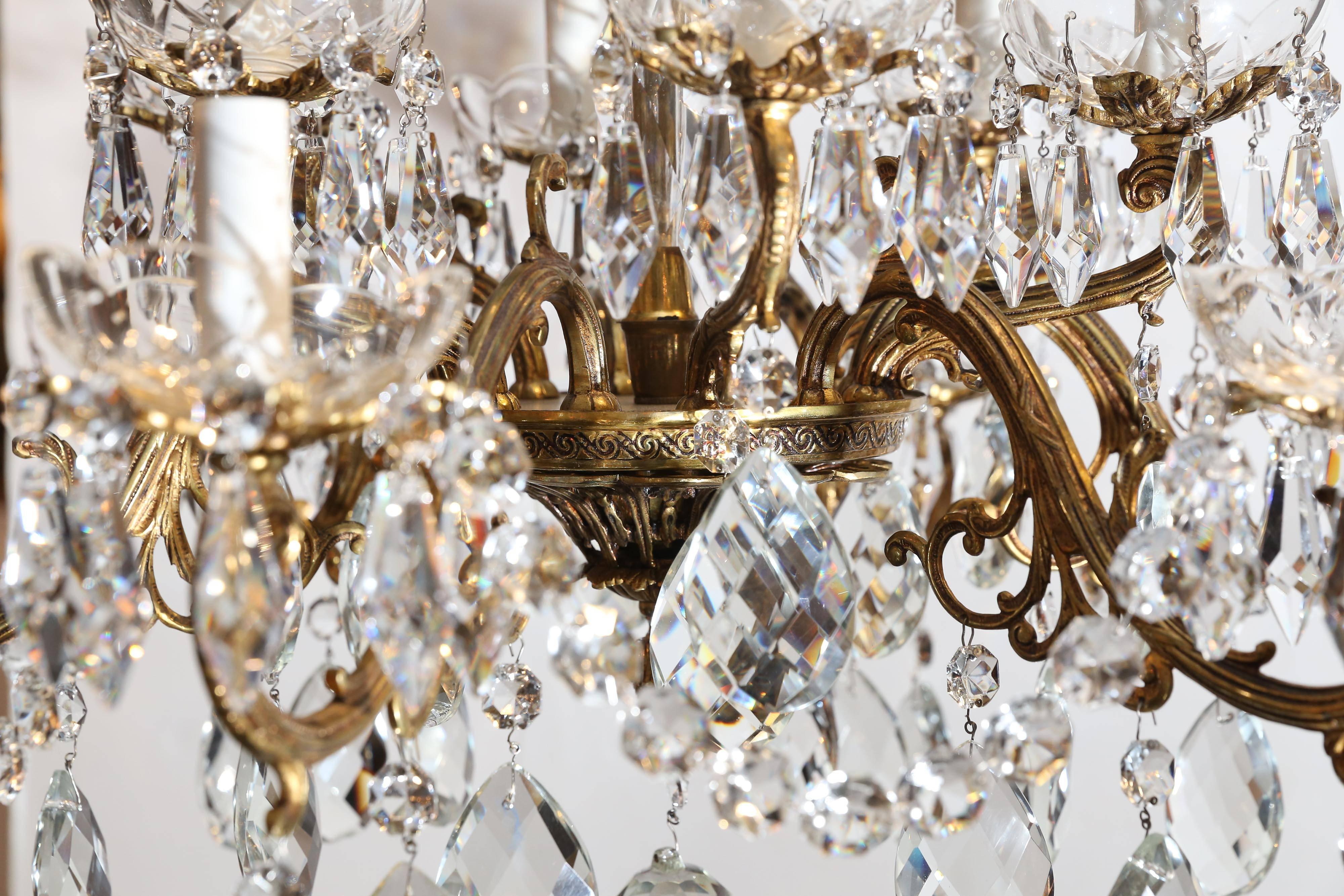 Cast Gilt Bronze Twelve-Light Chandelier For Sale