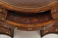 Antique Small English Mahogany Desk with Embossed Leather Top and Brass Gallery