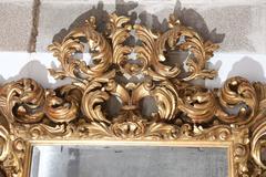 Heavily Carved and Gilt Italian Baroque Mirror