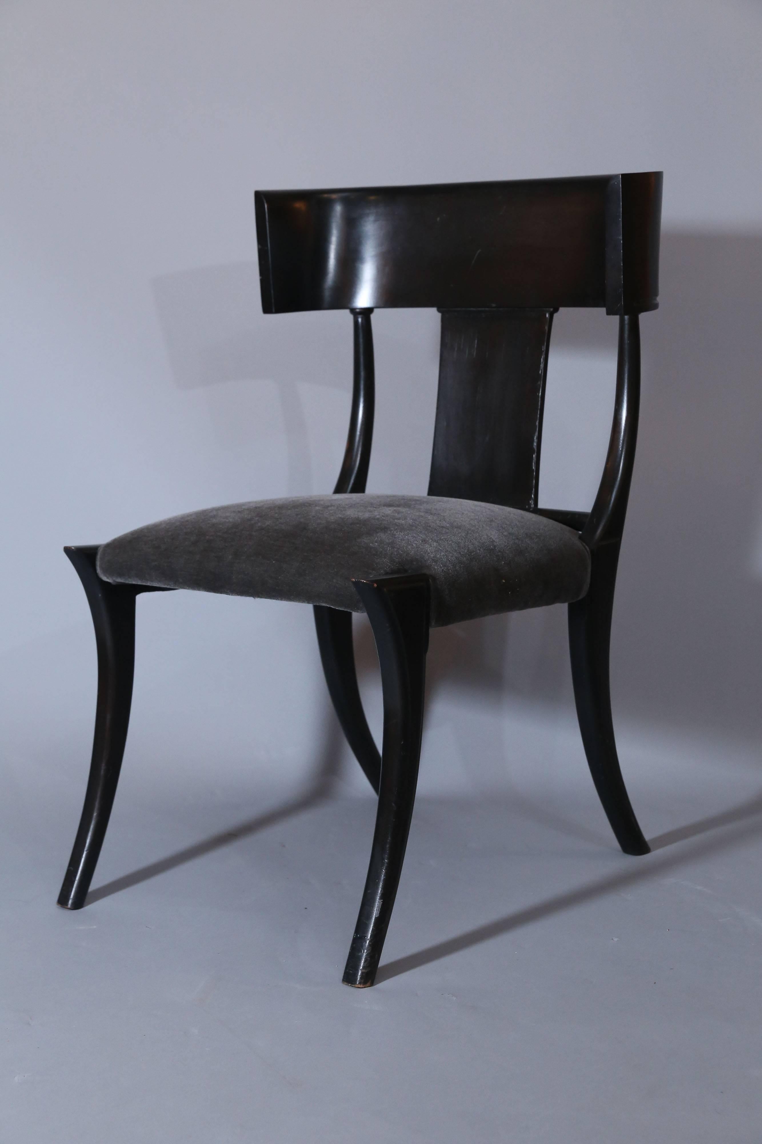 Custom Ebony stained Klismos chairs.

Scale of these chairs is larger than most, as the seats are quite wide.

Seats are upholstered in a dark grey mohair.