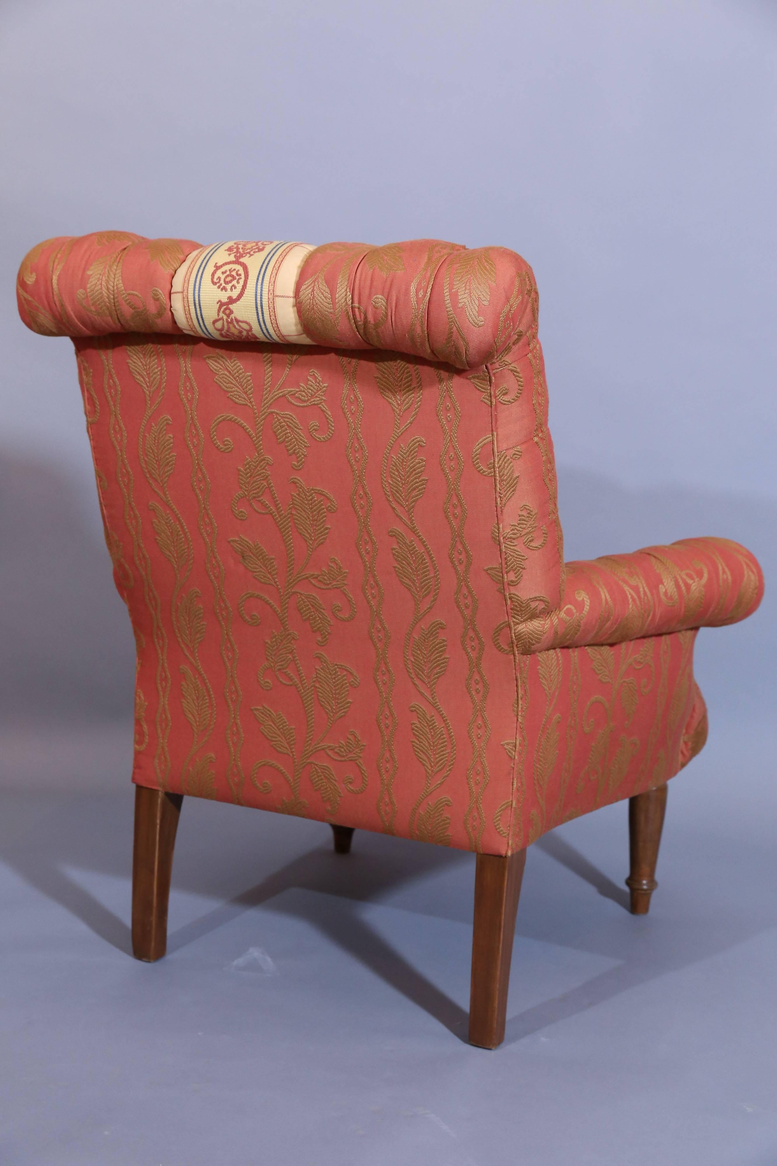 Tufted Napoleon III style club chair was designed by Bunny Williams for a 
personal client.

Contrasting band runs down the front of chair, which adds an elegant touch.

Extremely comfortable.
 