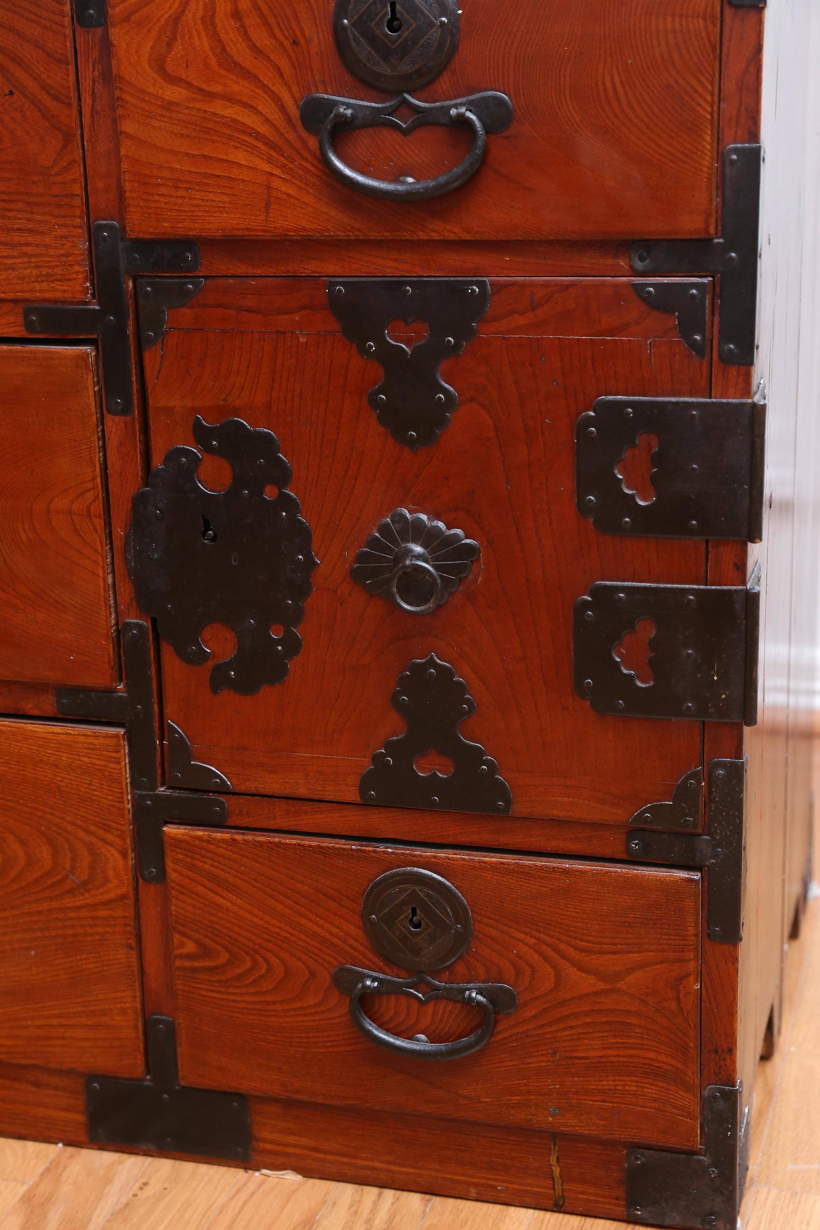 Early Meiji period Keyaki and cypress wood isho-Dansu Traditional tansu chest.
These chests were made for clothing storage and has eight compatments, which is typical.
  