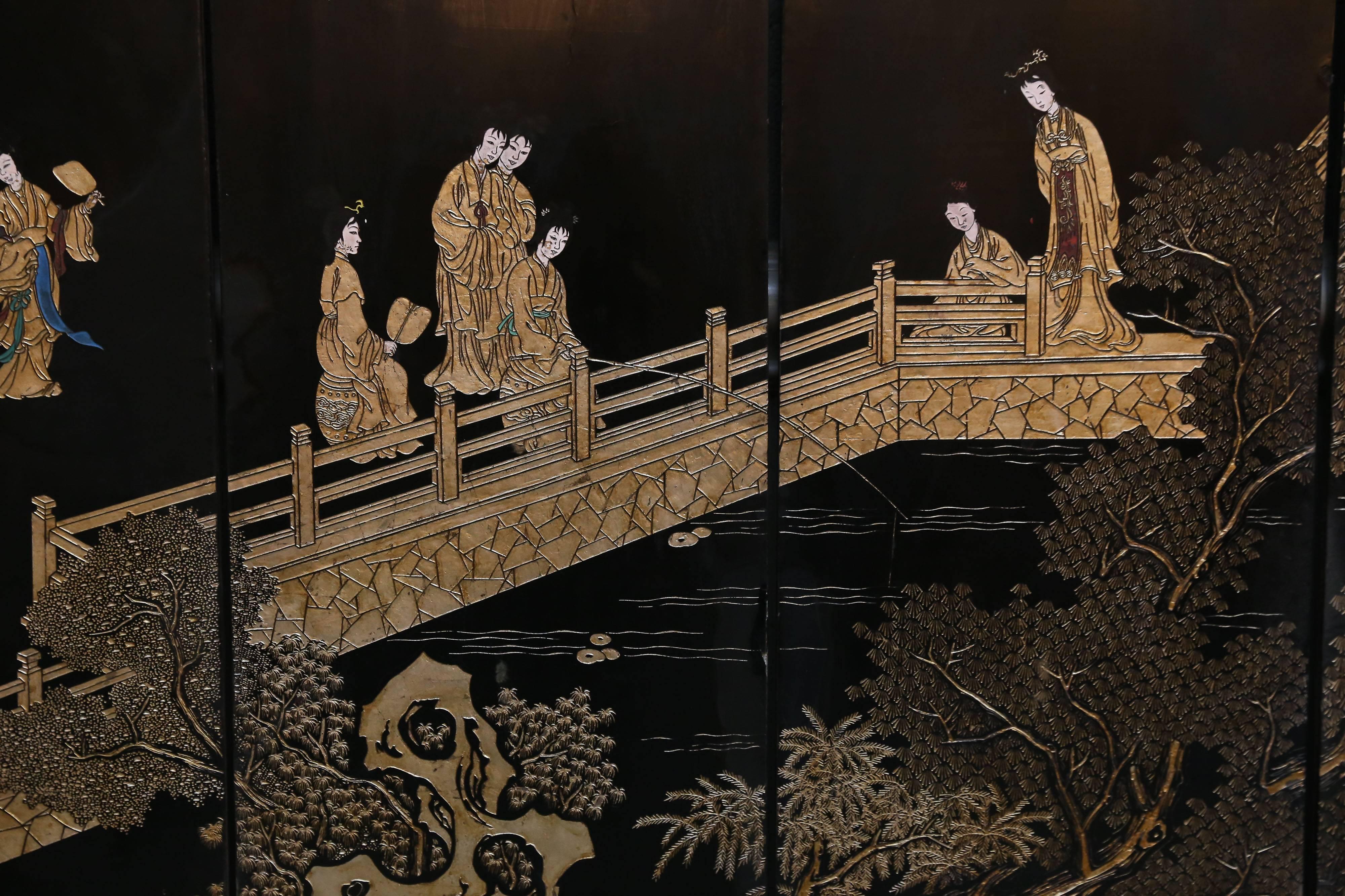 Coromandel screen features the story of a wealthy Chinese family.
A woman in the family is shown fishing on a bridge with a servant fanning her.
Another panel has the Matriarch walking with her son giving him advice.

At the bottom of each panel