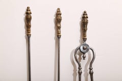 Three-Piece Set of Polished Steel Fireplace Tools with Brass Finials
