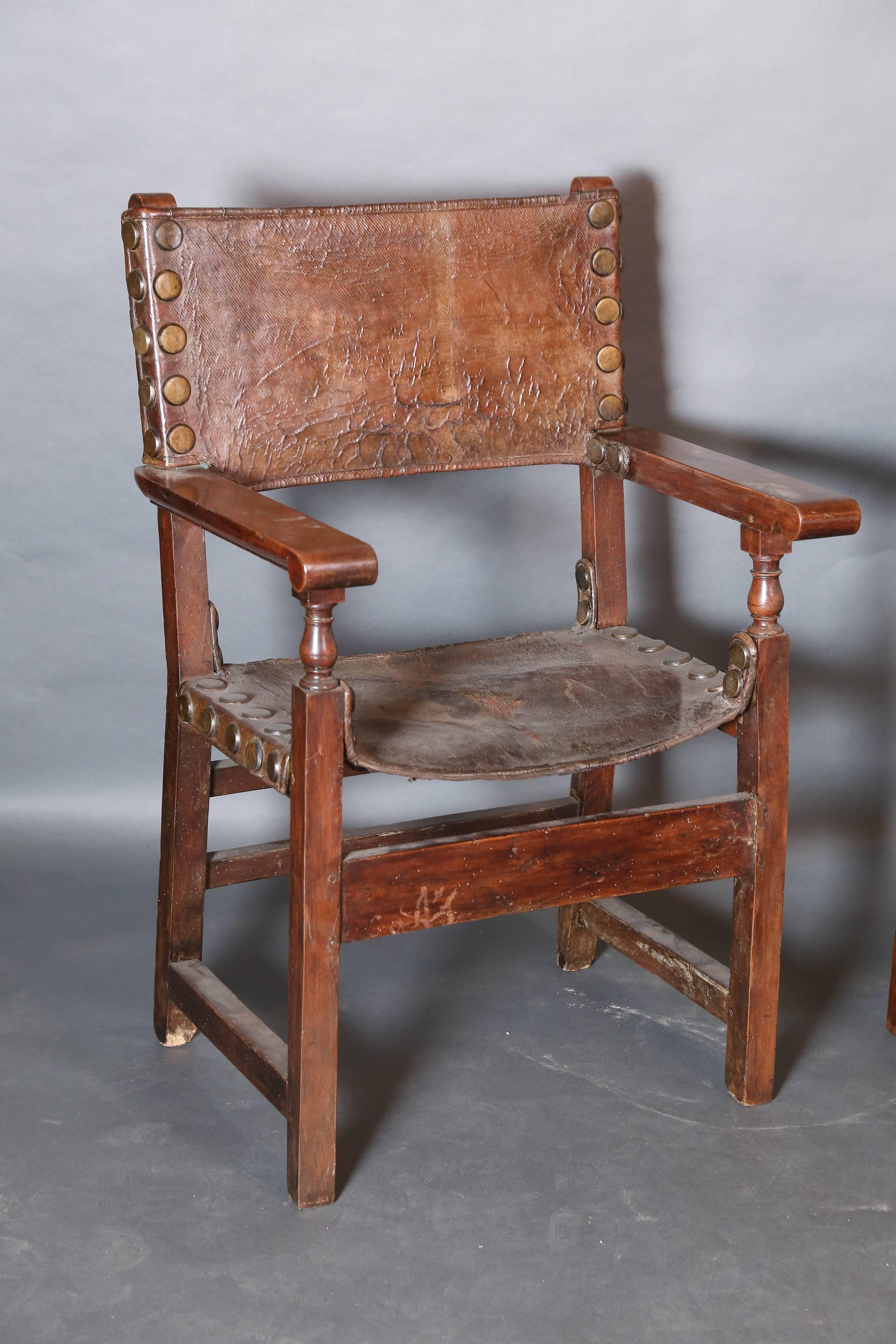 Carved Two 17th Century Spanish Oak and Leather Renaissance Armchairs For Sale