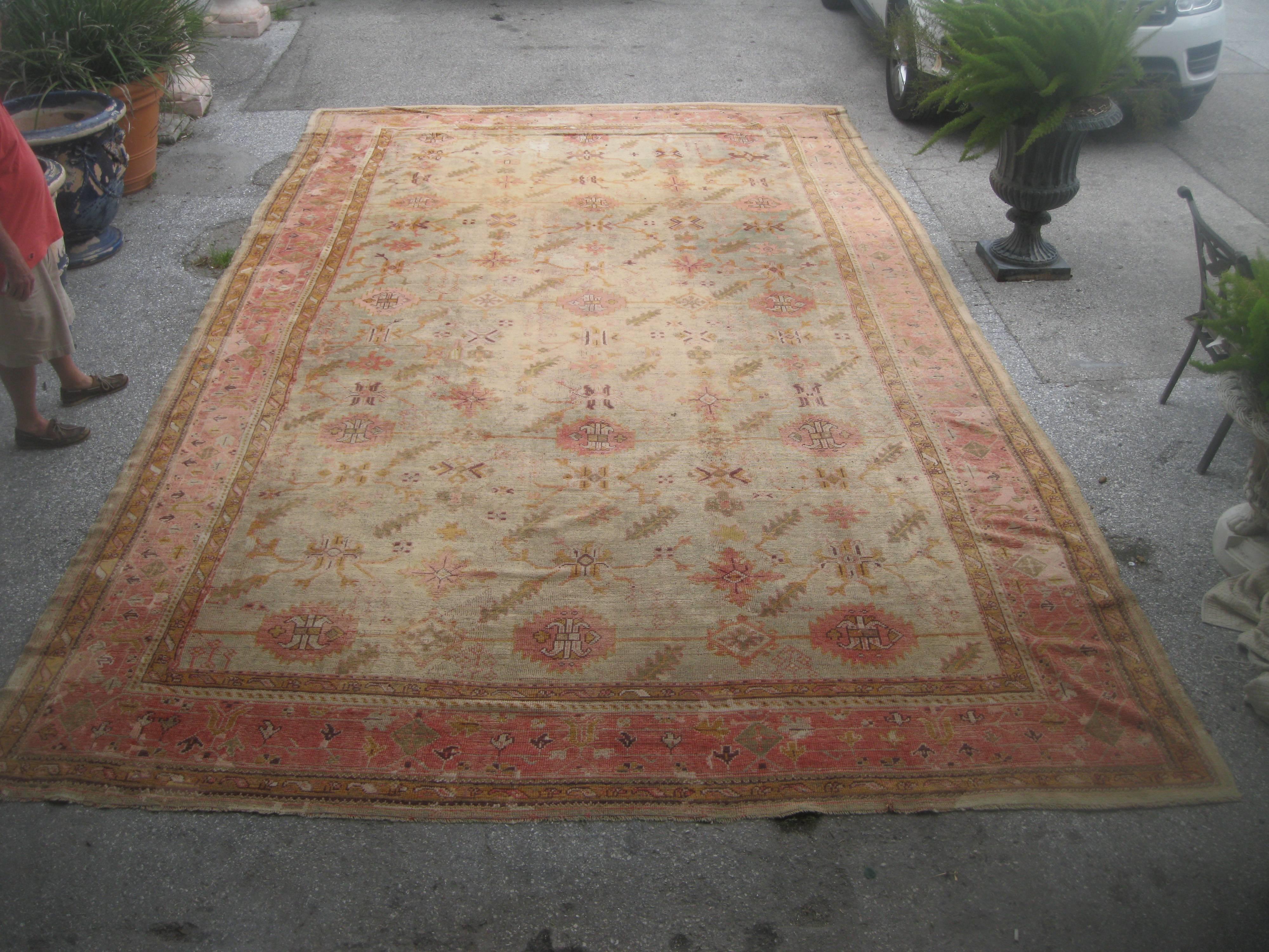 Soft hued antique large Oushak rug with subtle geometric pattern.

Originally purchased from Matt Camron 

  