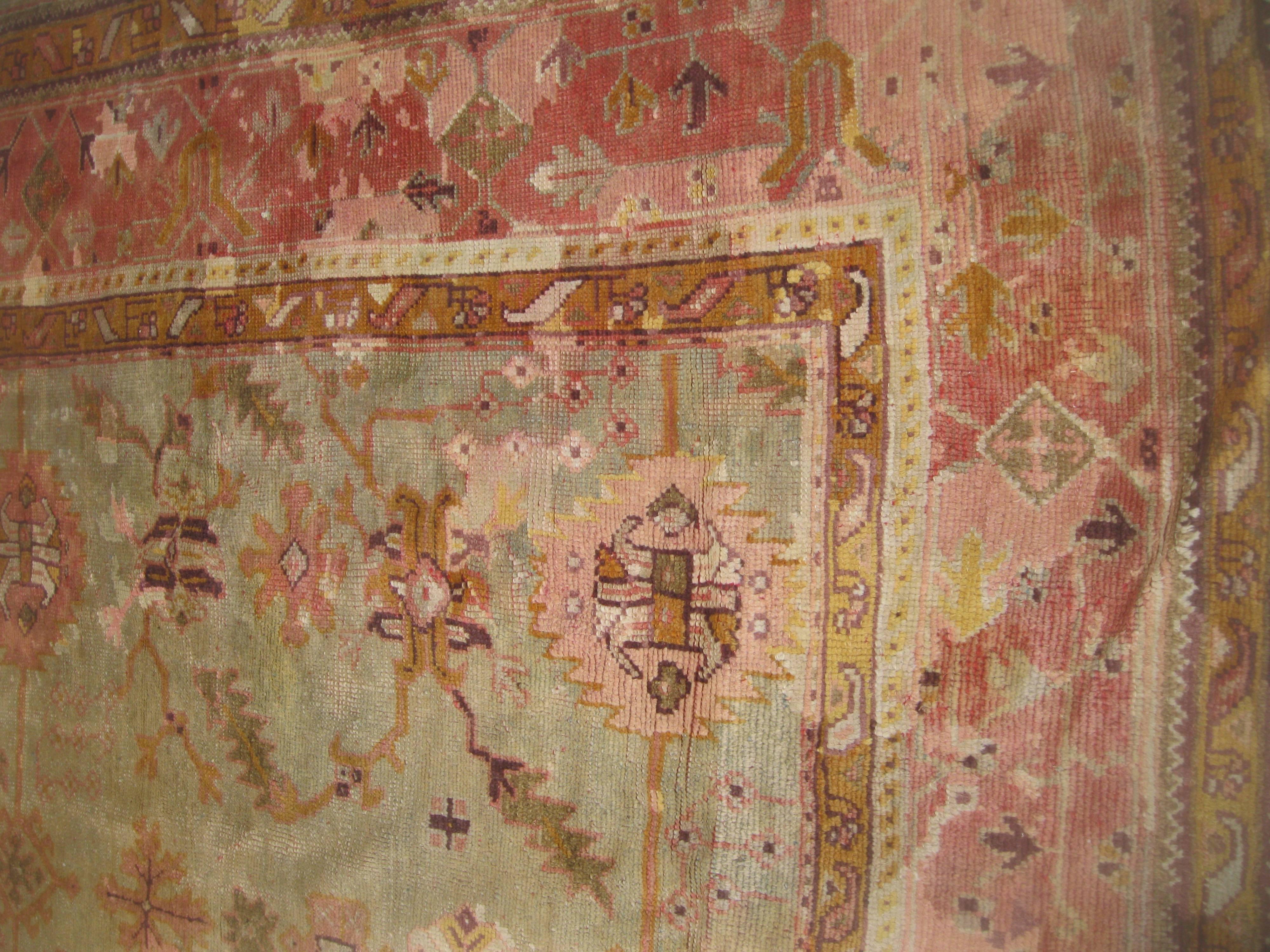 Hand-Woven Antique Oushak in Peach Tones For Sale