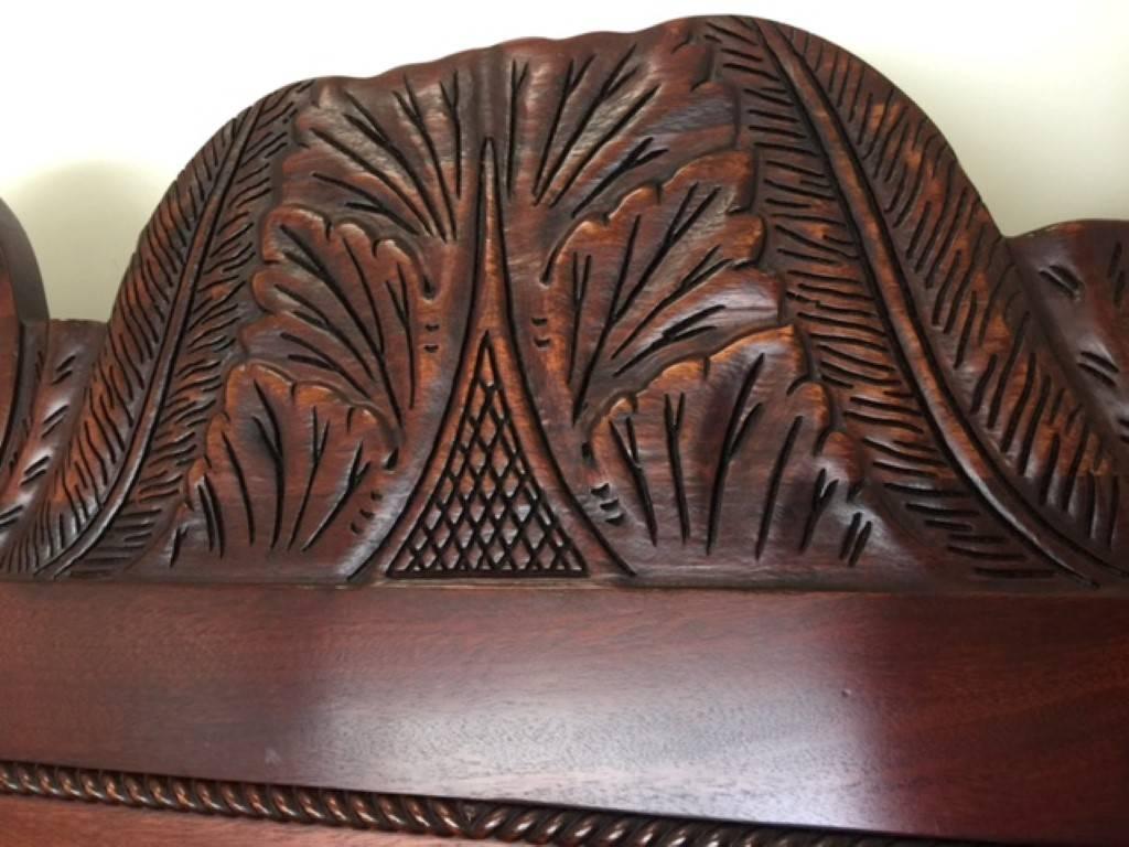 Very handsome carved mahogany four-post from the now discontinued
Ralph Lauren "Safari Collection".

Posts are heavily carved with finials and headboard has carving at top.

Matching Butler's table available.
