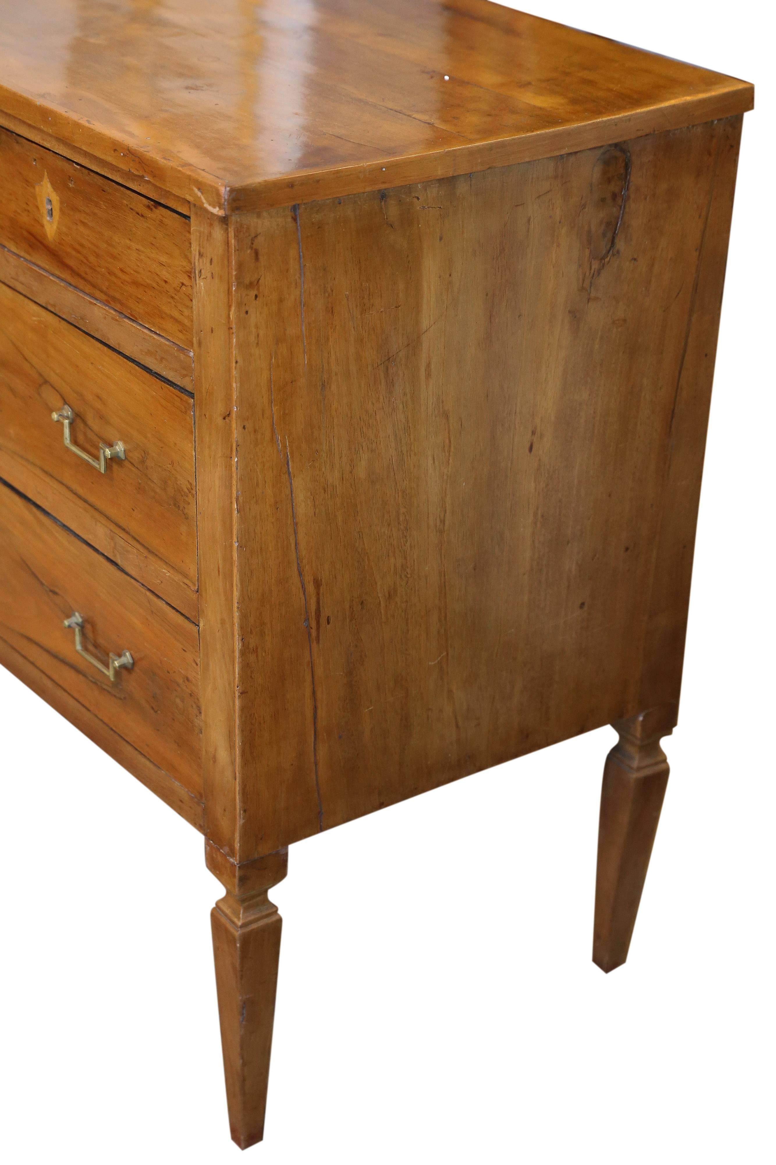 Clean lines and the beauty of walnut patina make this a very handsome chest.