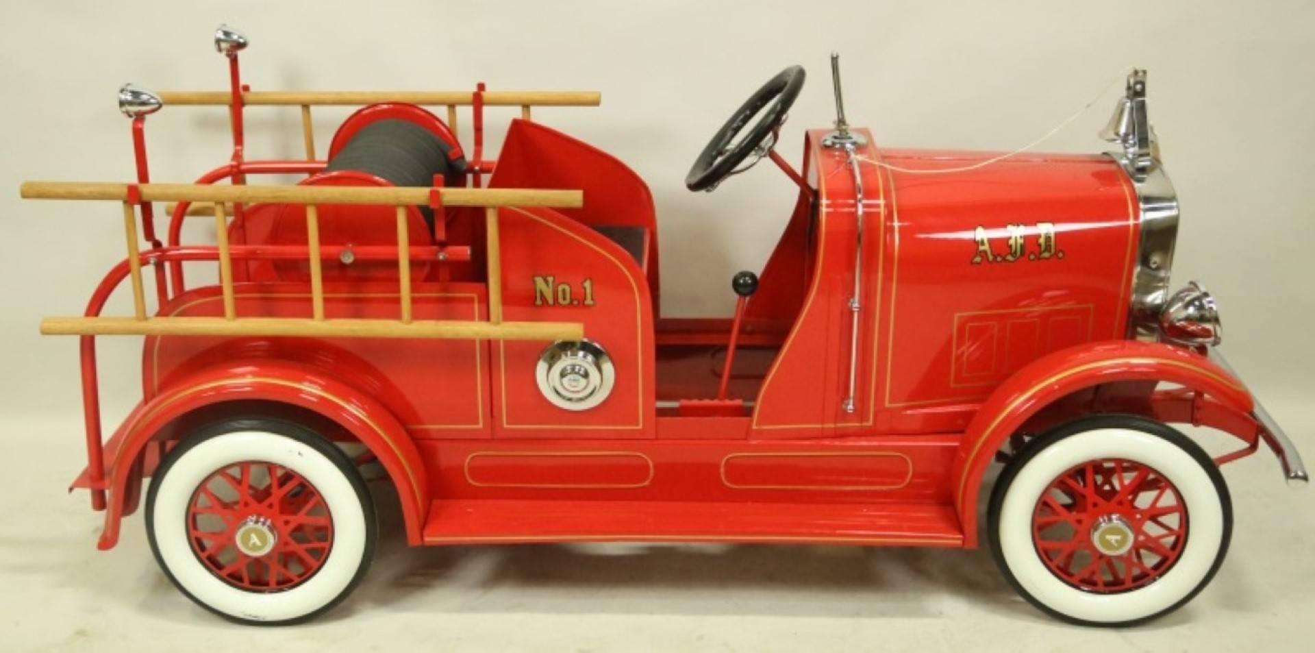 Fully restored 1930 American national fire truck has the finest of details,
from the front bumper to the back step.

Other features include front lights, spoked wheels with whitewall tires, fenders,
running boards, a pair of ladders, fire hose,