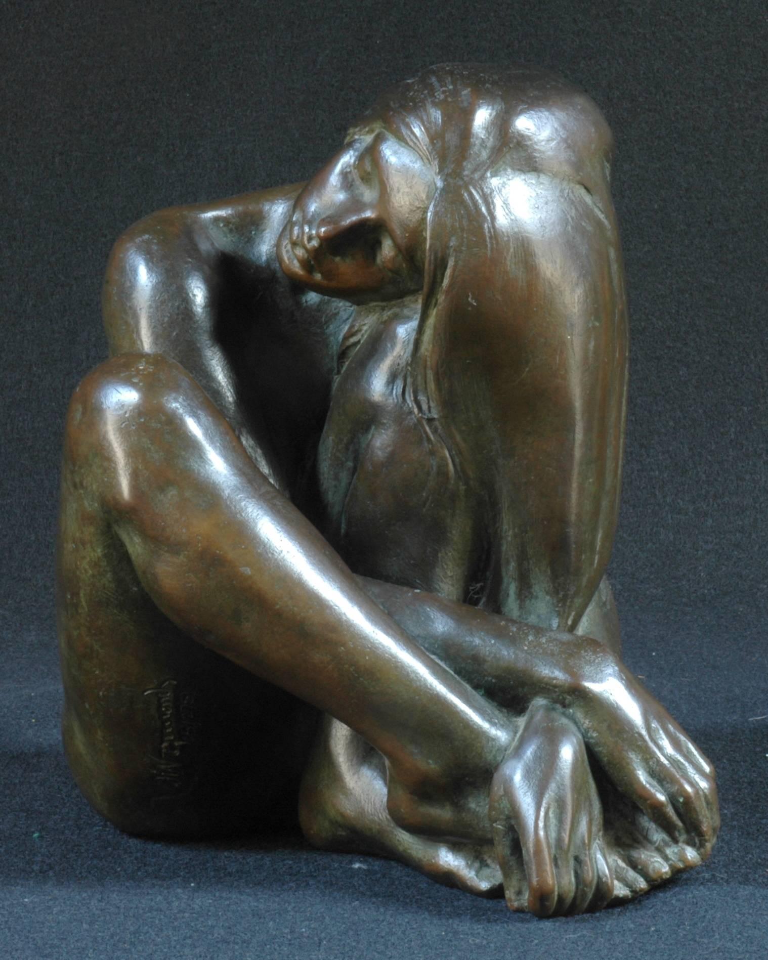 Bronze sculpture of a nude seated young woman with long flowing hair

Signed and numbered 5/275, foundry stamp, dated 1/14/88.