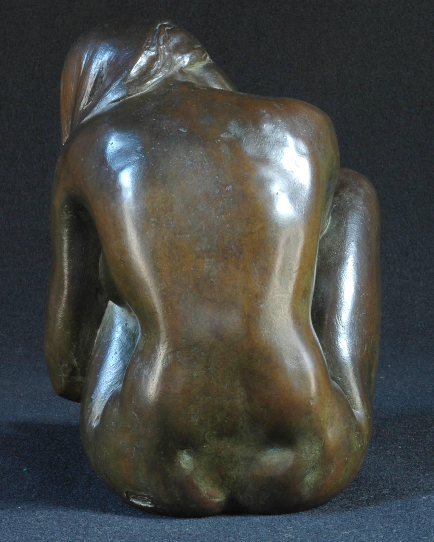 Cast Bronze Sculpture of a Nude Seated Woman with Long Flowing Hair For Sale