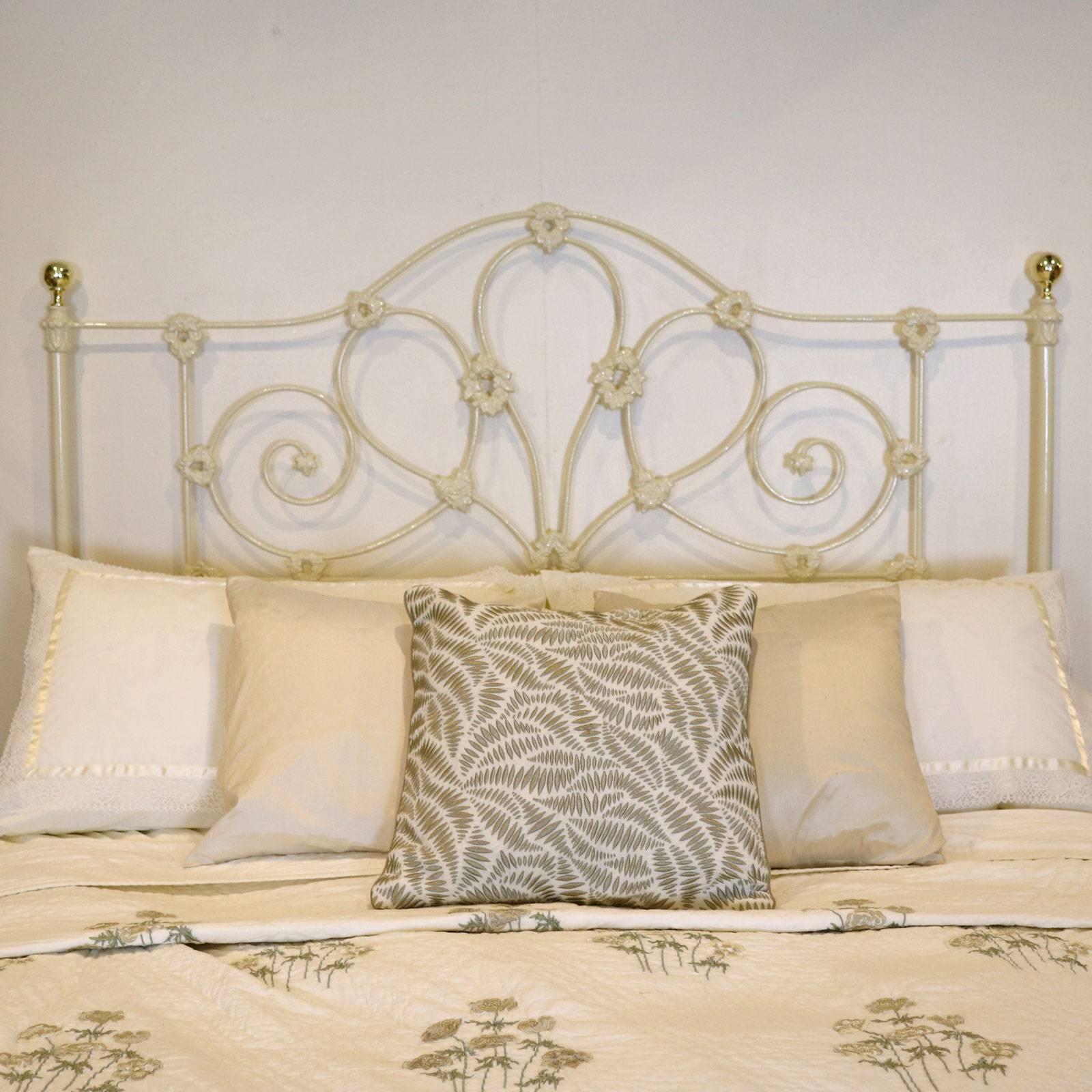 Quality mid Victorian cast iron bed with superbly cast panel decoration. This bed is finished in stove enamel cream but could have a colour change to suit your requirements.

The bed accepts a British king-size (5ft wide, 60 in or 150 cm) or