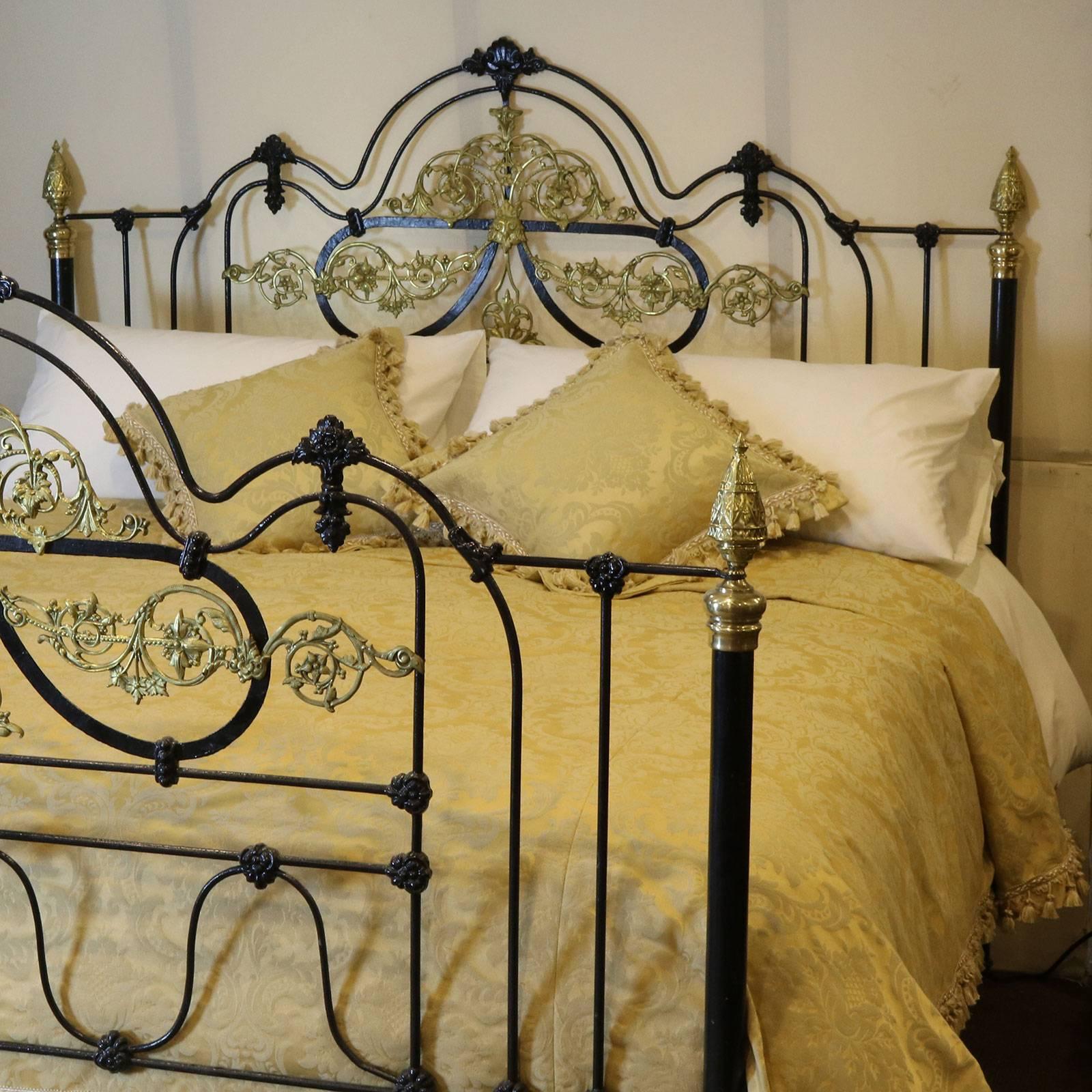 A superb wide bed in cast iron and brass finished in black. This bed has been adapted from an original bed, circa 1880. It was originally manufactured in the UK around the Birmingham area and shipped out to Morocco in the late 19th century.

The