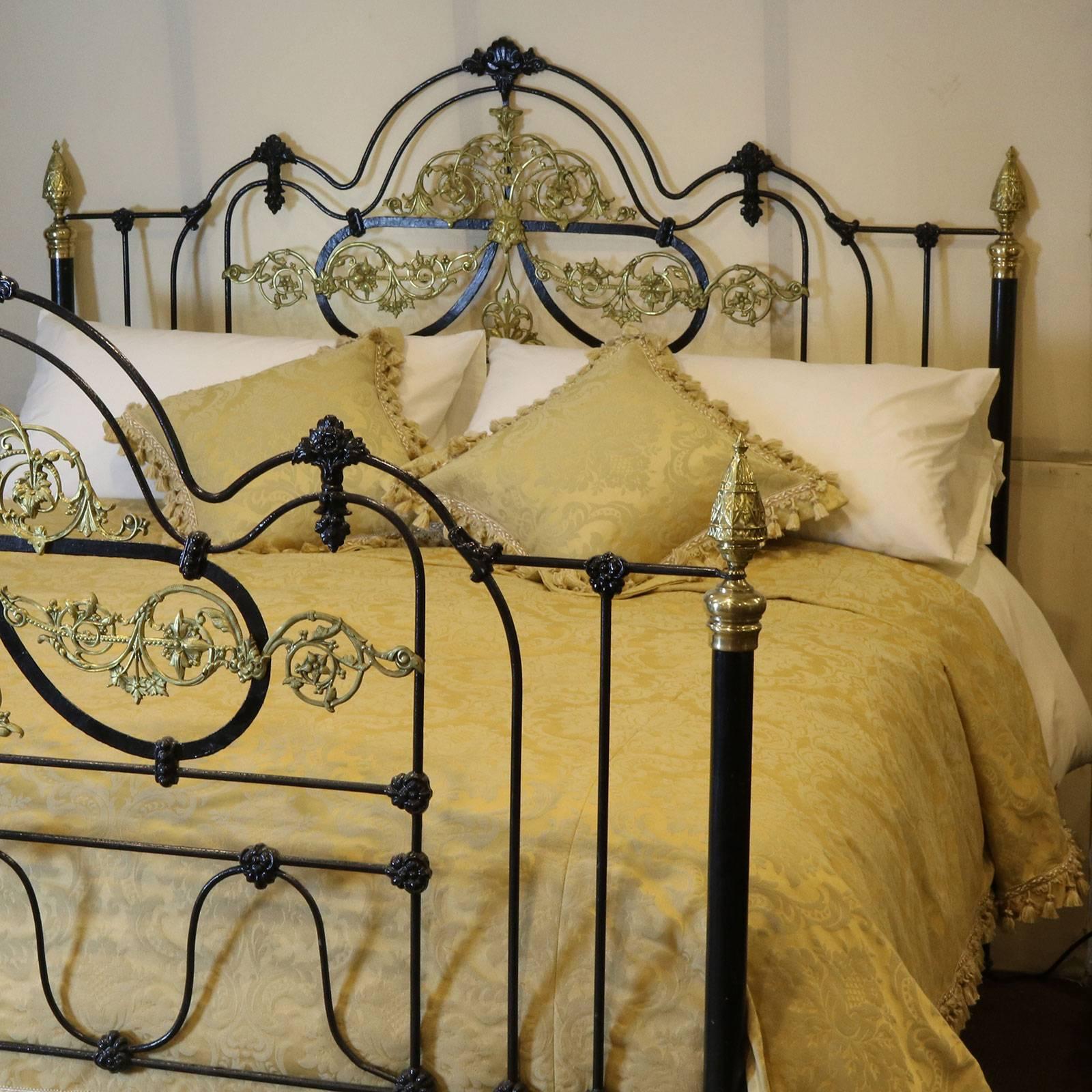 A superb wide bed in cast iron and brass finished in black. This bed has been adapted from an original bed, circa 1880. It was originally manufactured in the UK around the Birmingham area and shipped out to Morocco in the late 19th century.

The