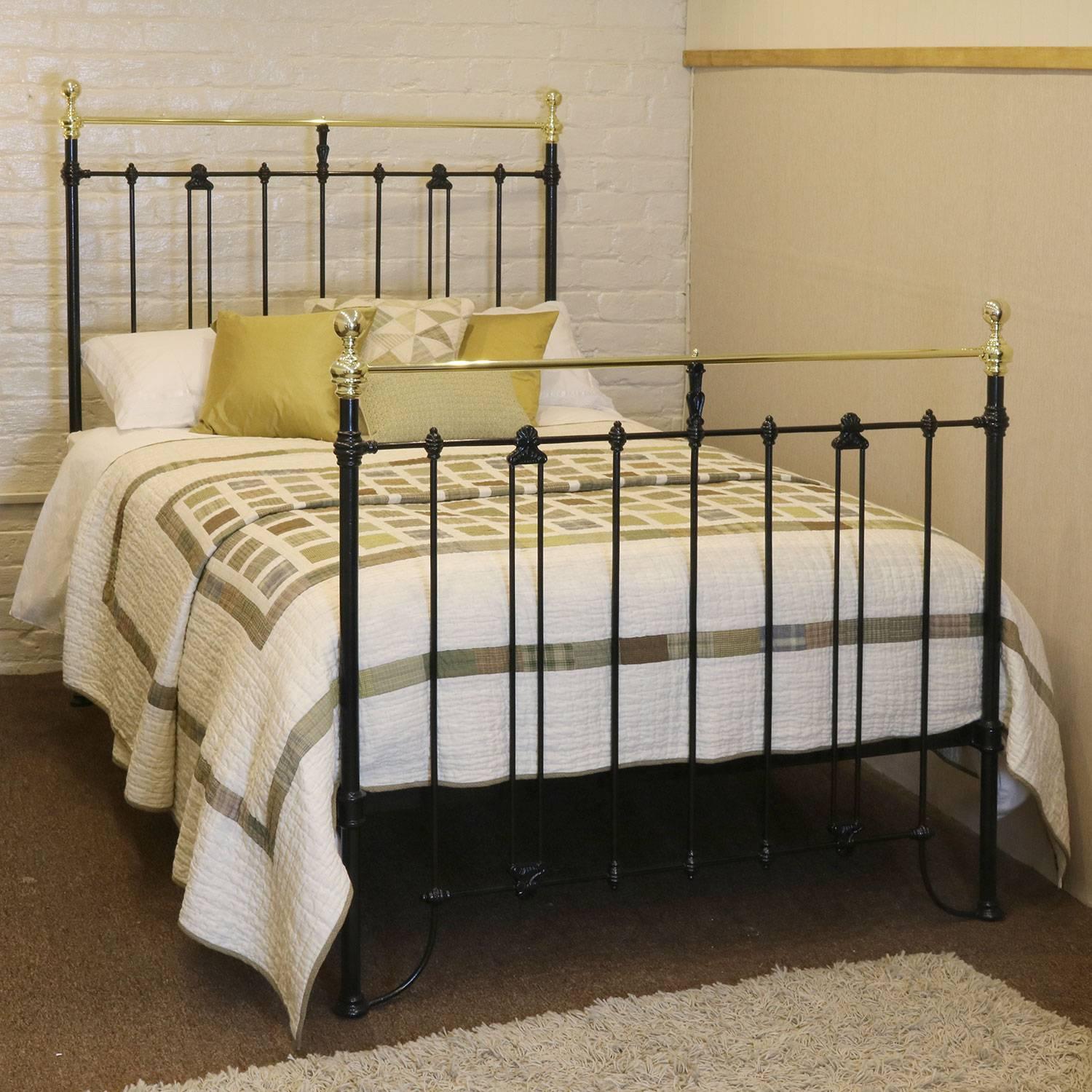 A classical style brass and iron bedstead with straight brass top rail and decorative castings.

This bed accepts a double size (54 inches, 4ft 6in wide) base and mattress set.

The price is for the bed frame alone. The base, mattress, bedding