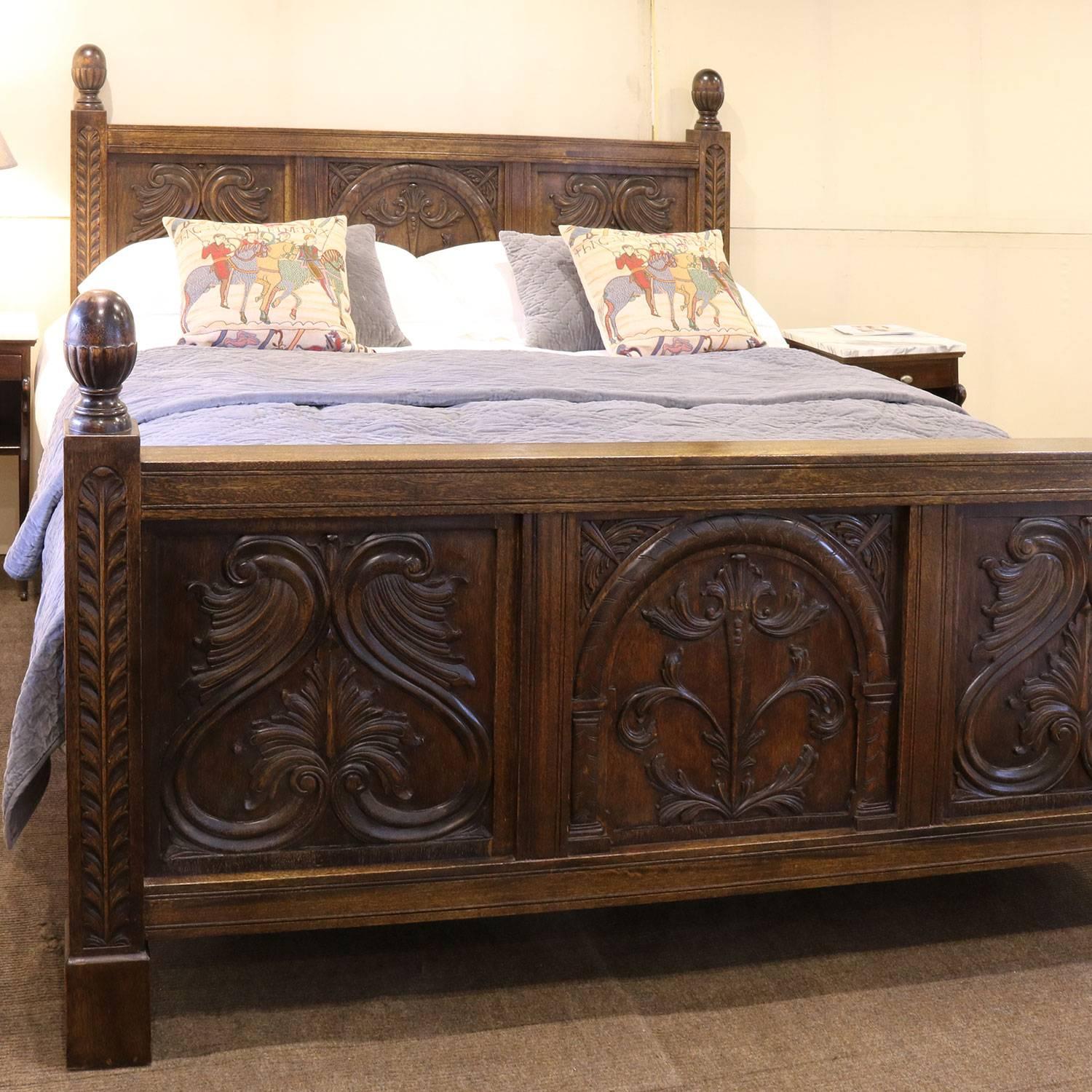 A wide Jacobean style bed with carved panels and acorn finials.

This bed accepts a 72 inch wide (6ft or 180cm) British super king-size or Californian king-size base and mattress set.

The price is for the bed frame alone. The base, mattress,