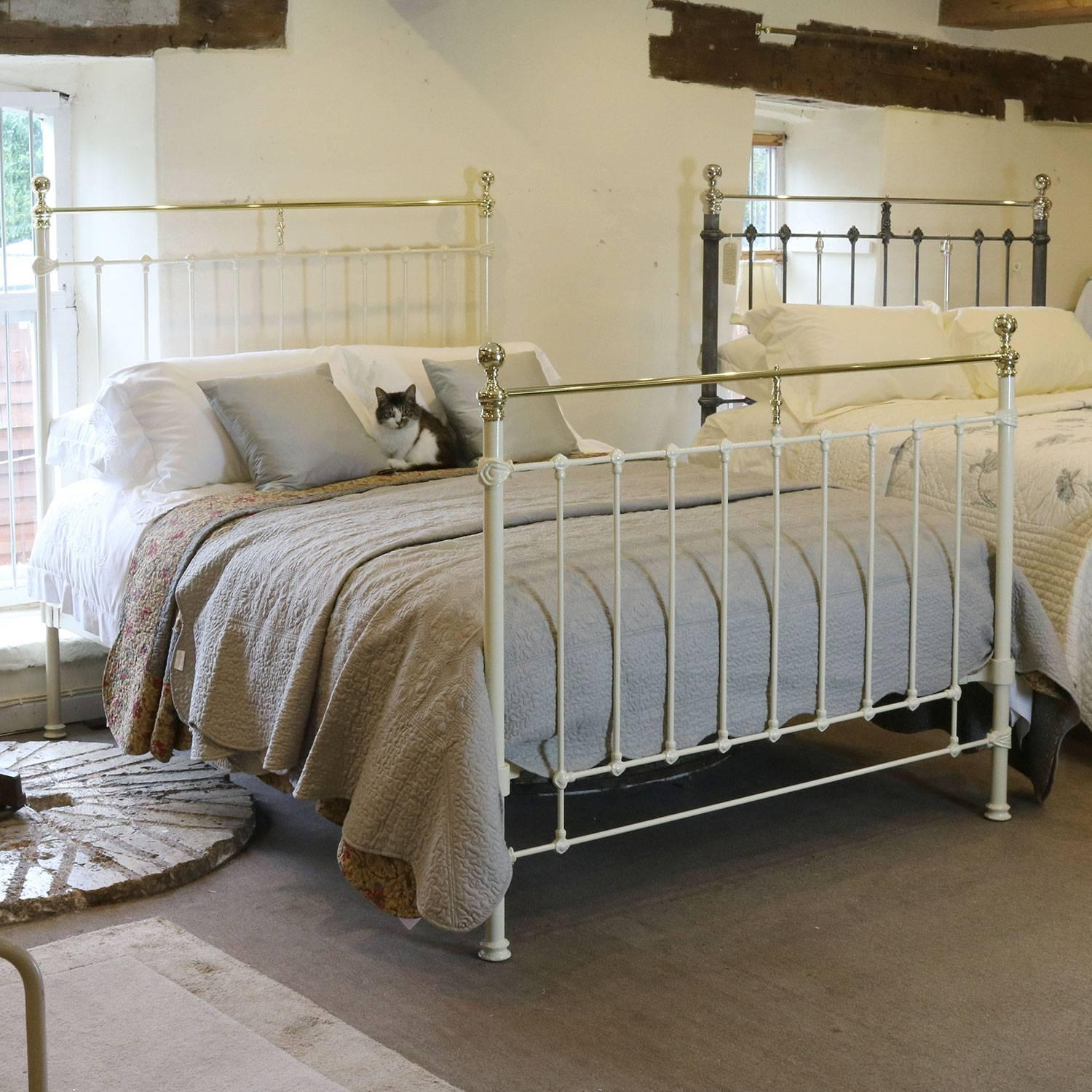 A fine brass and iron bed adapted from an original Victorian frame and finished in cream with straight brass top rails.

This bed accepts a British king-size or American queen-size (60 inches, 5ft or 150cm) base and mattress.

The price is for
