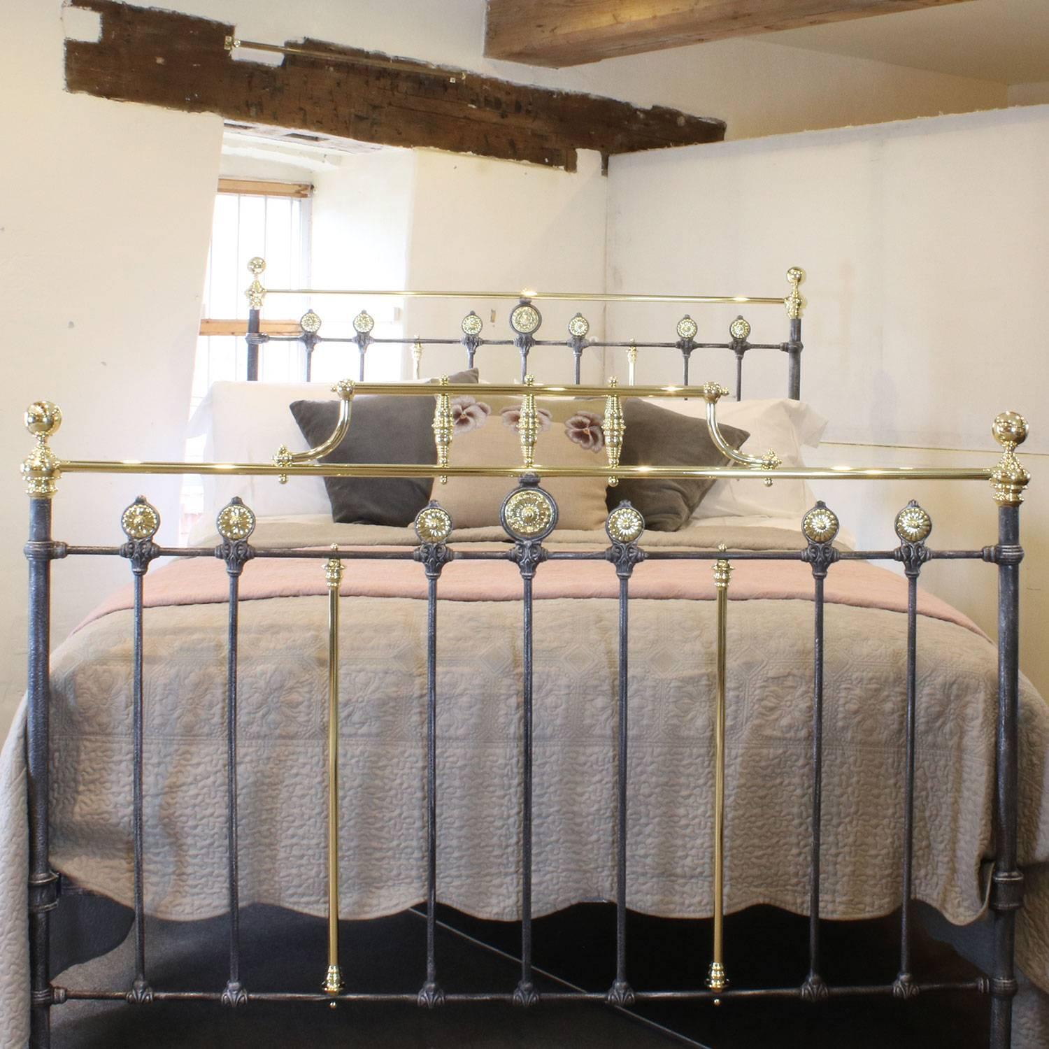 A decorative brass and iron bed in charcoal paint finish adapted from an original Victorian frame.

This bed accepts a British king-size or American queen-size (60 inches, 5 feet or 150 cm) base and mattress set.

The price is for the bed frame