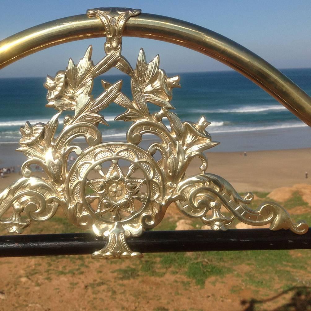 This cast iron and brass bedstead was originally manufactured in the UK around the Birmingham area, circa 1880, and shipped out to Morocco in the late 19th century.

The bed accepts a British king-size or American queen-size base and mattress (60