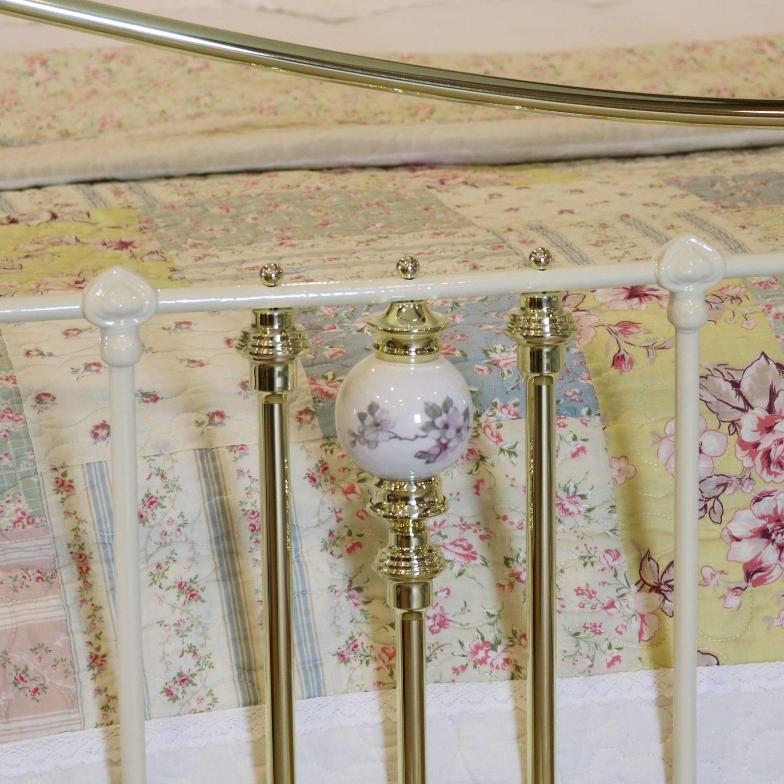 brass bed with porcelain knobs