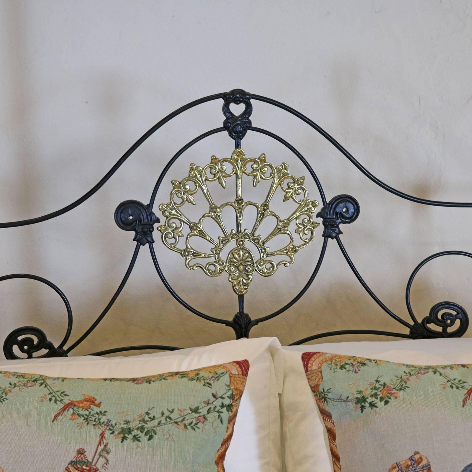 wrought iron four poster bed