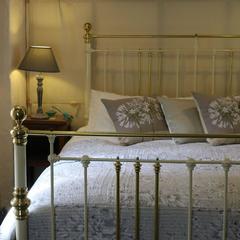 Wide Brass and Iron Bed in Cream