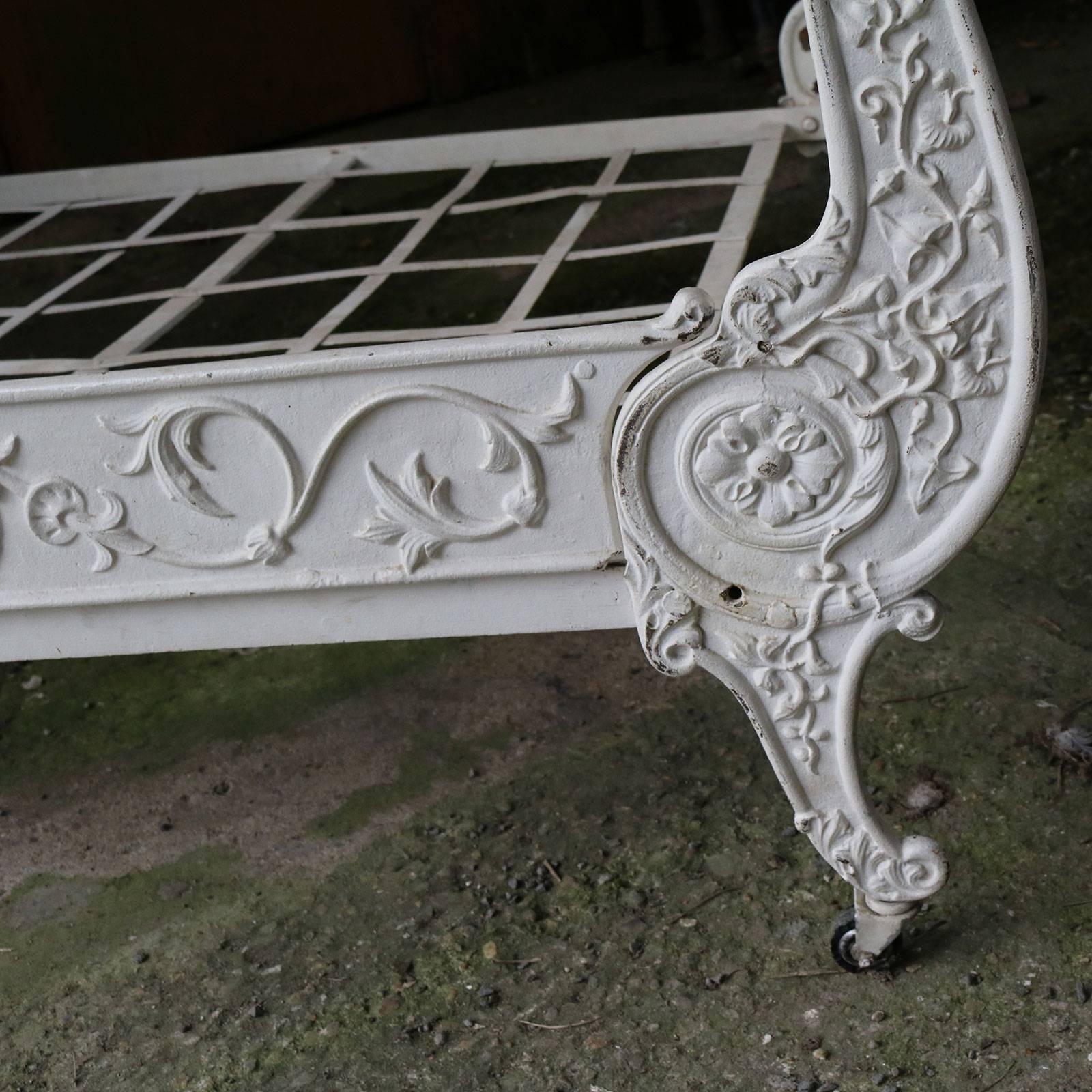 A superb cast iron daybed with roule-shaped ends and cast front panel.

This daybed accepts a 41 x 72 inch mattress, which can be supplied by us. The price is for the bed frame alone. The base, mattress, bedding and linen are extra. 